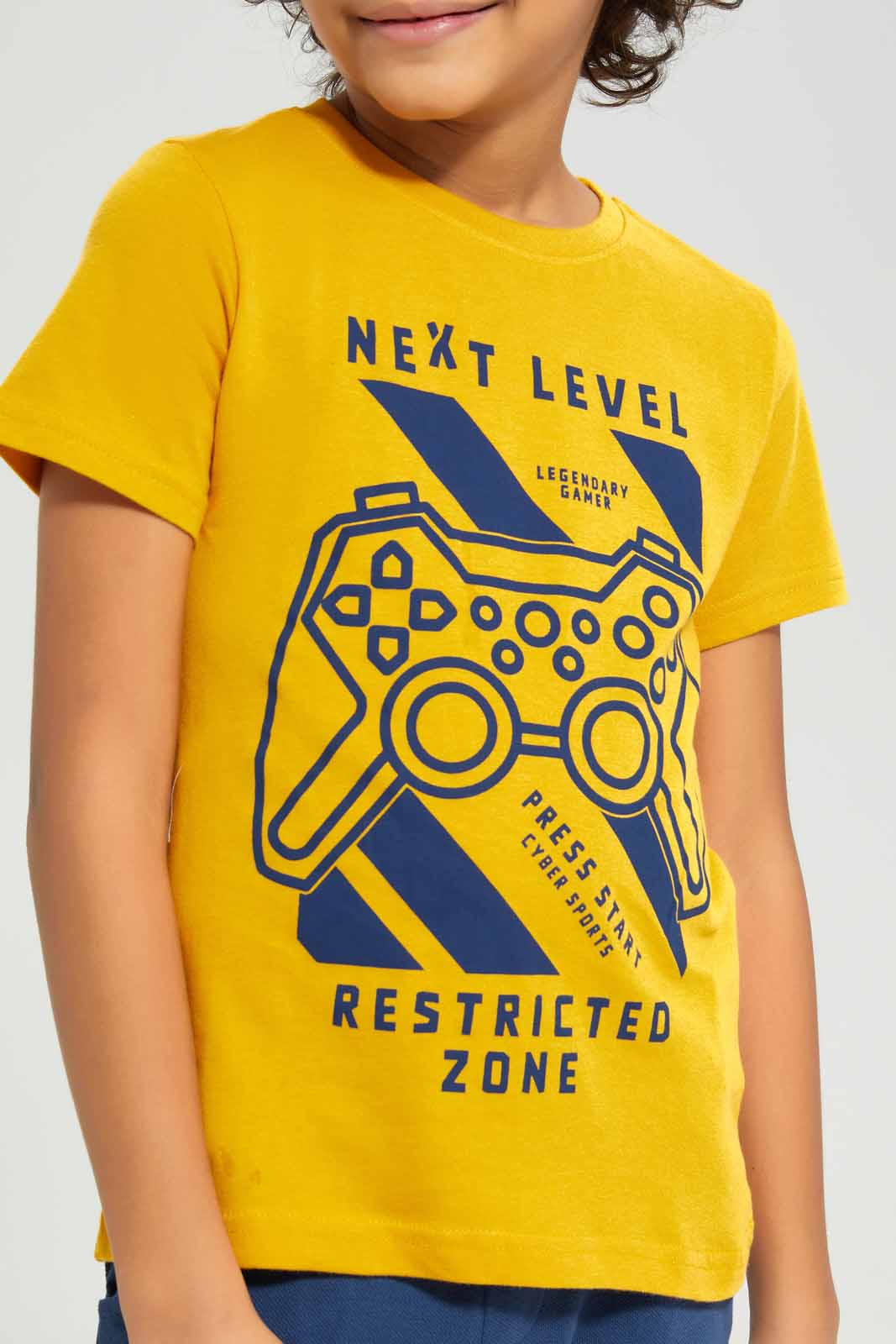 Redtag-Yellow-Gamer-Print-Short-Sleeve-T-Shirt-BOY-T-Shirts,-Category:T-Shirts,-Colour:Yellow,-Deals:New-In,-Filter:Boys-(2-to-8-Yrs),-New-In-BOY-APL,-Non-Sale,-Section:Boys-(0-to-14Yrs),-TBL,-W22A-Boys-2 to 8 Years