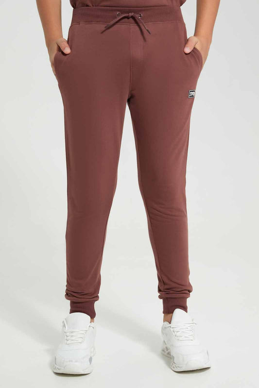 Redtag-Burgundy-Lounge-Wear-Active-Pants-BSR-Joggers,-Category:Joggers,-Colour:Burgundy,-Deals:New-In,-Filter:Senior-Boys-(8-to-14-Yrs),-New-In-BSR-APL,-Non-Sale,-Section:Boys-(0-to-14Yrs),-W22A-Senior-Boys-9 to 14 Years