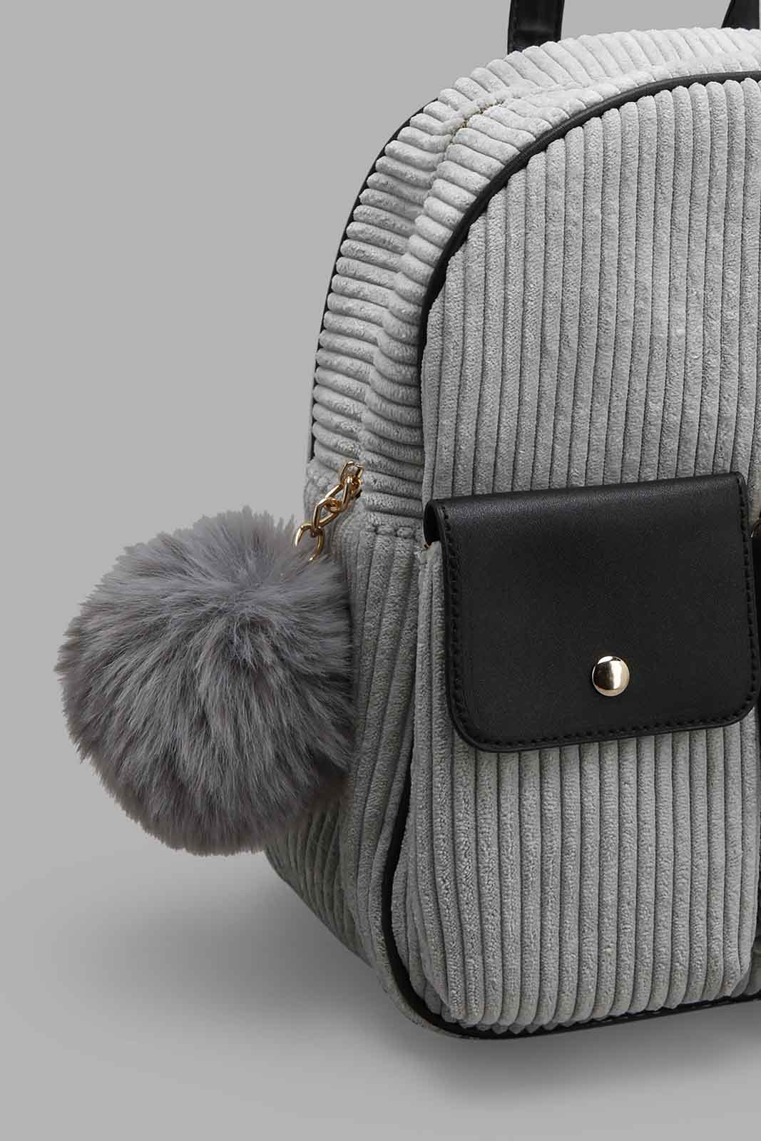 Redtag-Grey-Coudry-Backpack-With-Pom-Pom-Category:Bags,-Colour:Grey,-Filter:Girls-Accessories,-GIR-Bags,-New-In,-New-In-GIR-ACC,-Non-Sale,-Section:Girls-(0-to-14Yrs),-W22B-Girls-