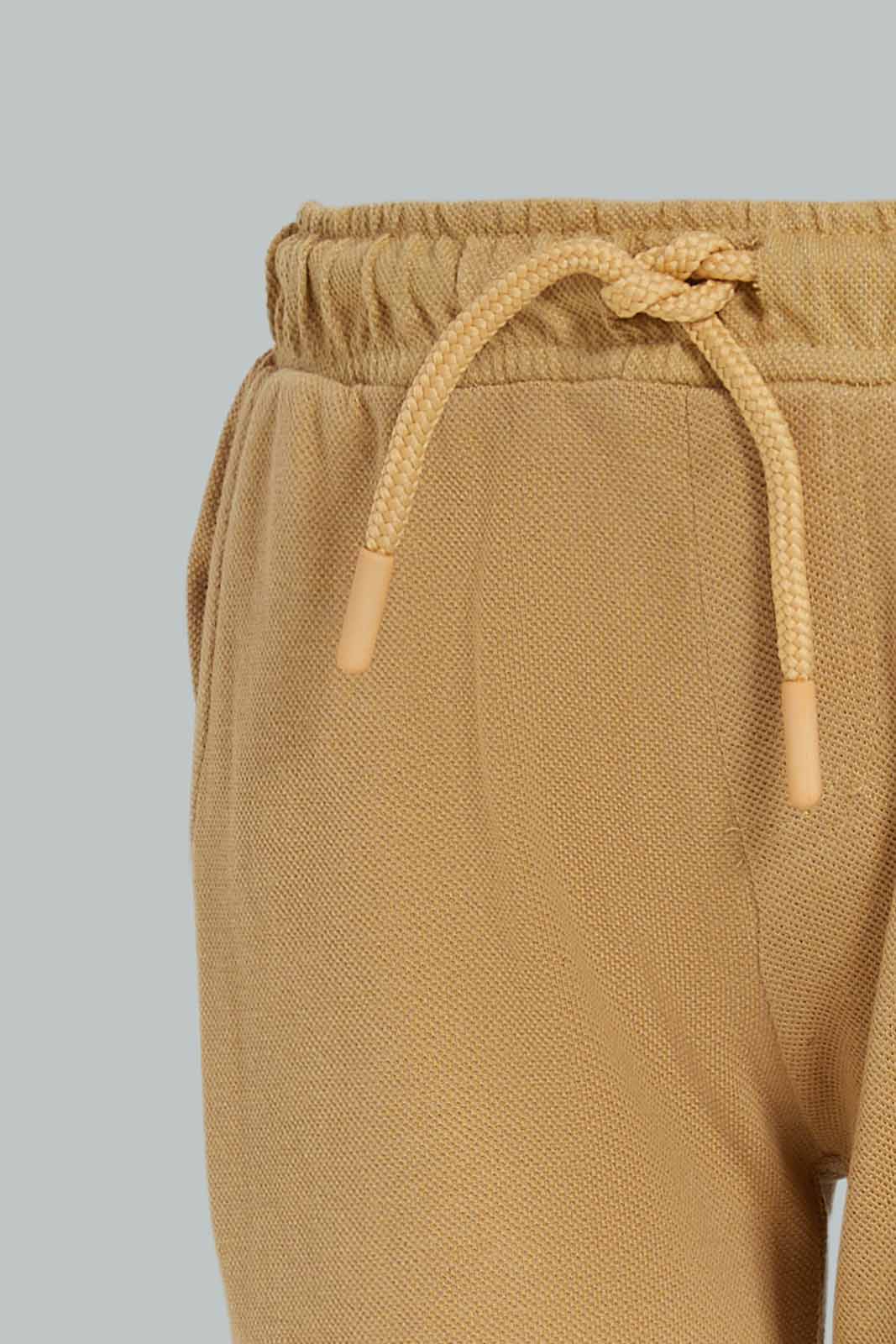 Redtag-Brown-Pique-Shorts-BOY-Shorts,-Category:Shorts,-Colour:Brown,-Deals:New-In,-Dept:Boys,-Filter:Boys-(2-to-8-Yrs),-New-In-BOY-APL,-Non-Sale,-Section:Boys-(0-to-14Yrs),-TBL,-W22A-Boys-2 to 8 Years