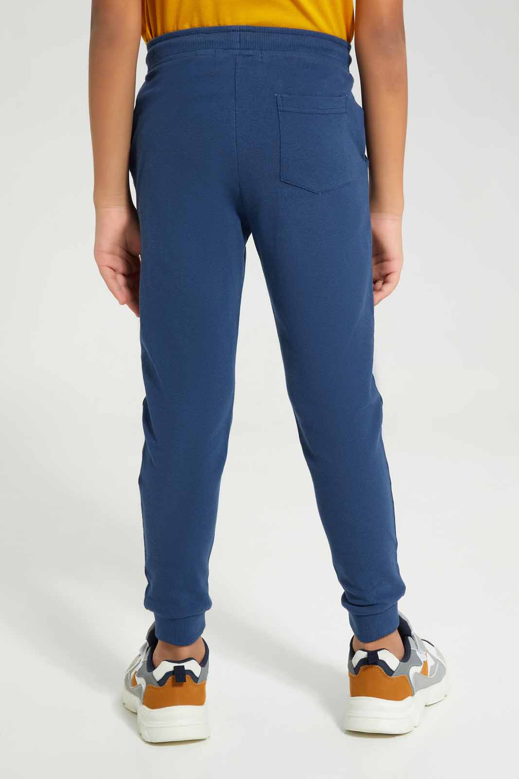 Redtag-Blue-Pique-Jog-Pants-BOY-Joggers,-Category:Joggers,-Colour:Black,-Deals:New-In,-Filter:Boys-(2-to-8-Yrs),-New-In-BOY-APL,-Non-Sale,-Section:Boys-(0-to-14Yrs),-W22A-Boys-2 to 8 Years