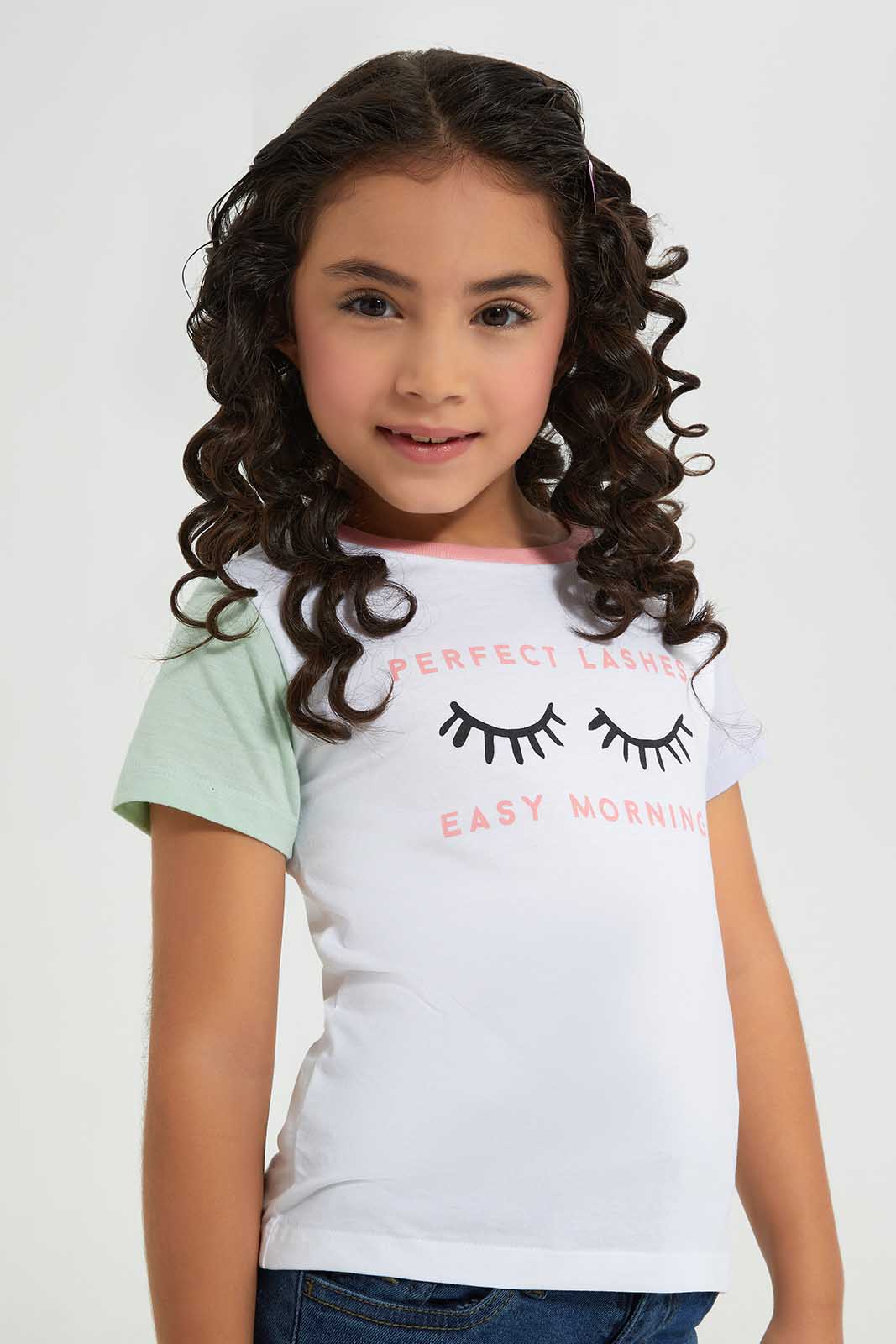 Redtag-Basic-Tee---Eyelashesh-White-Category:T-Shirts,-Colour:White,-Deals:New-In,-Filter:Girls-(2-to-8-Yrs),-GIR-T-Shirts,-New-In-GIR-APL,-Non-Sale,-Section:Girls-(0-to-14Yrs),-TBL,-W22A-Girls-2 to 8 Years