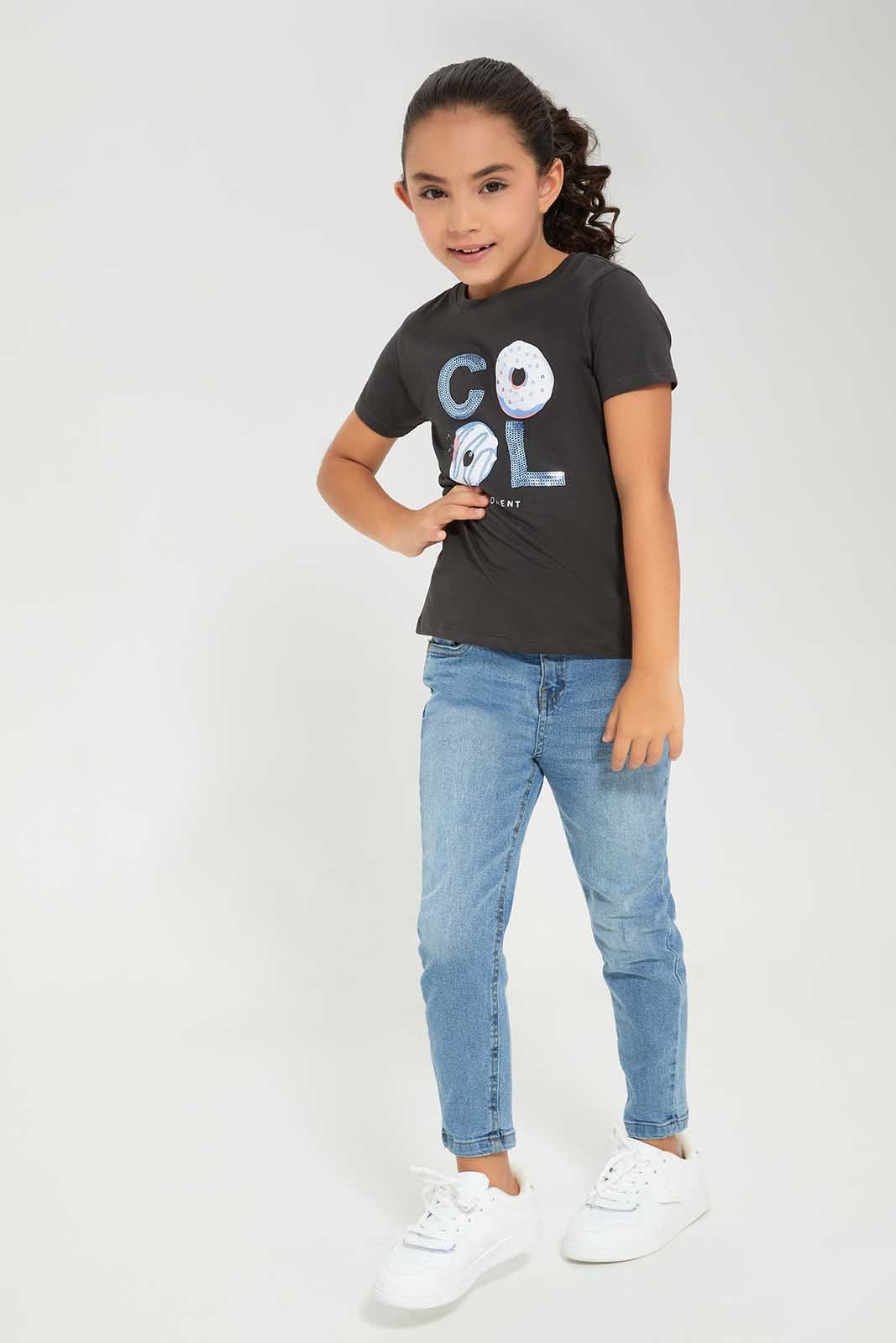 Redtag-Black-LS-Novelty-Donut-Gliter-Print-Category:T-Shirts,-Colour:Black,-Deals:New-In,-Filter:Girls-(2-to-8-Yrs),-GIR-T-Shirts,-New-In-GIR-APL,-Non-Sale,-Section:Girls-(0-to-14Yrs),-TBL,-W22A-Girls-2 to 8 Years