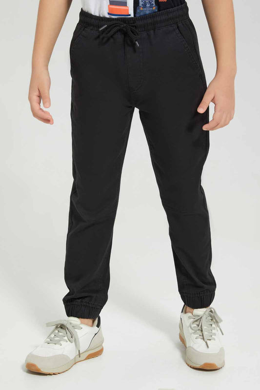 Redtag-Black-Twill-Stretch-Jogger-BOY-Trousers,-BTS,-Category:Trousers,-Colour:Black,-Deals:New-In,-Filter:Boys-(2-to-8-Yrs),-New-In-BOY-APL,-Non-Sale,-Section:Boys-(0-to-14Yrs),-TBL,-W22B-Boys-2 to 8 Years