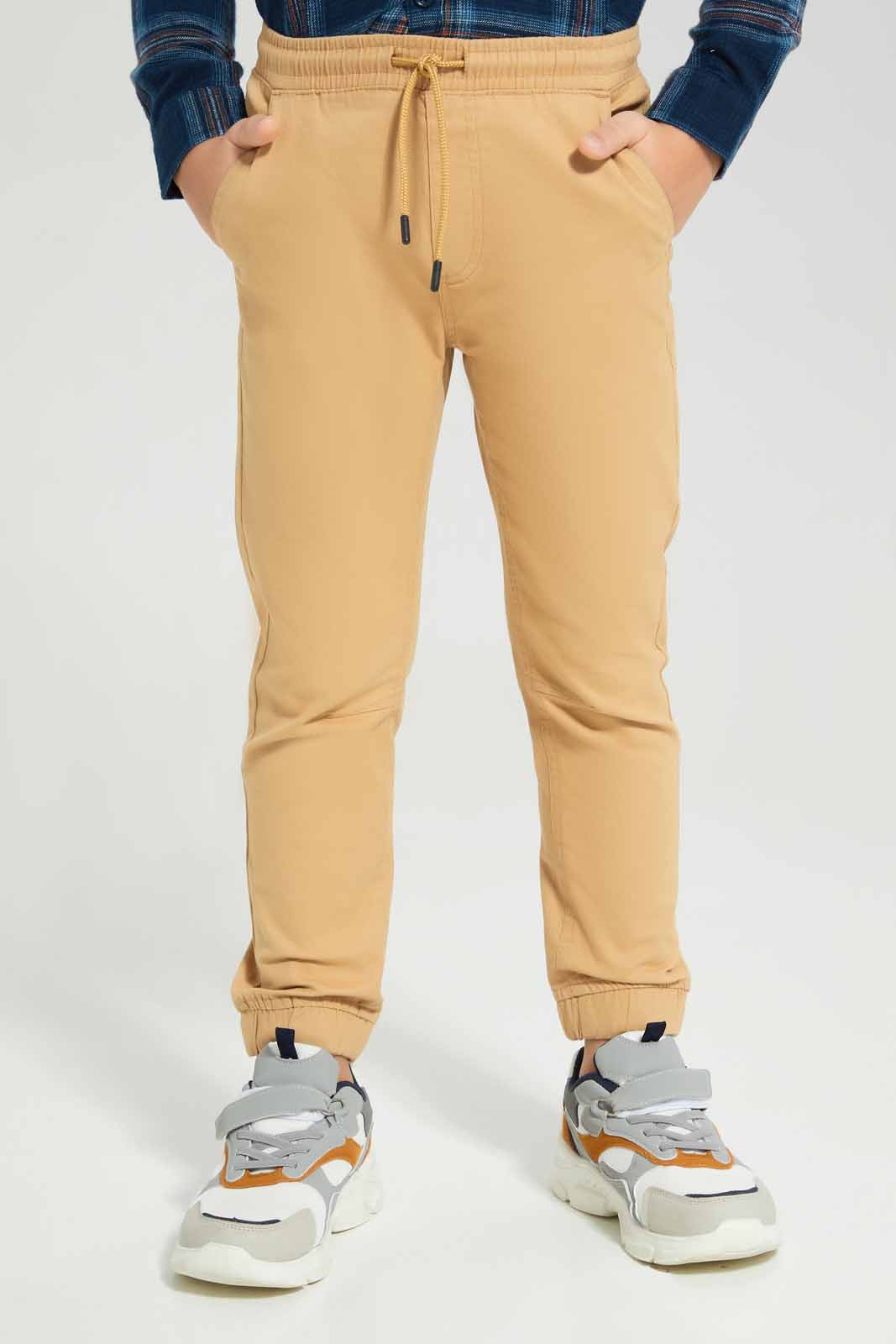 Redtag-Beige-Twill-Stretch-Jogger-BOY-Trousers,-Category:Trousers,-Colour:Beige,-Deals:New-In,-Filter:Boys-(2-to-8-Yrs),-New-In-BOY-APL,-Non-Sale,-Section:Boys-(0-to-14Yrs),-TBL,-W22B-Boys-2 to 8 Years