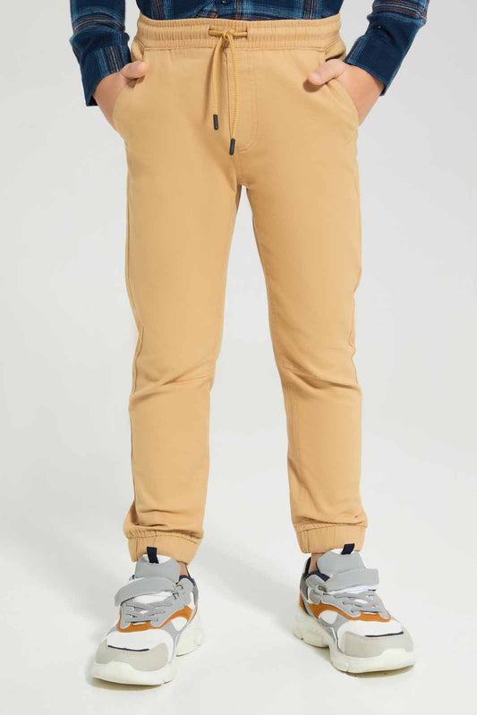 Redtag-Beige-Twill-Stretch-Jogger-BOY-Trousers,-Category:Trousers,-Colour:Beige,-Deals:New-In,-Filter:Boys-(2-to-8-Yrs),-New-In-BOY-APL,-Non-Sale,-Section:Boys-(0-to-14Yrs),-TBL,-W22B-Boys-2 to 8 Years