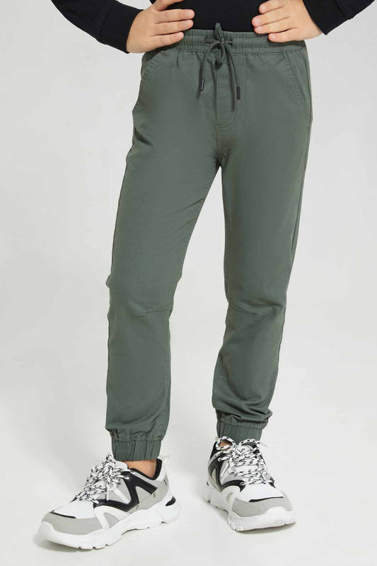 Redtag-Dark-Green-Twill-Stretch-Jogger-BOY-Trousers,-Category:Trousers,-Colour:Olive,-Deals:New-In,-Filter:Boys-(2-to-8-Yrs),-New-In-BOY-APL,-Non-Sale,-Section:Boys-(0-to-14Yrs),-TBL,-W22B-Boys-2 to 8 Years