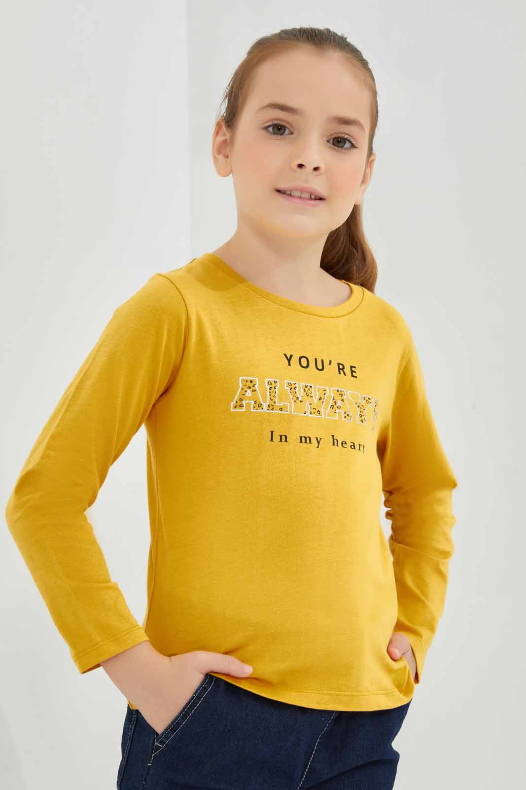 Redtag-Mustard-Ls-Basic-Tee-Slogan---Mustard-Category:T-Shirts,-Colour:Mustard,-Deals:New-In,-Dept:Girls,-Filter:Girls-(2-to-8-Yrs),-GIR-T-Shirts,-New-In-GIR-APL,-Non-Sale,-Section:Girls-(0-to-14Yrs),-TBL,-W22B-Girls-2 to 8 Years