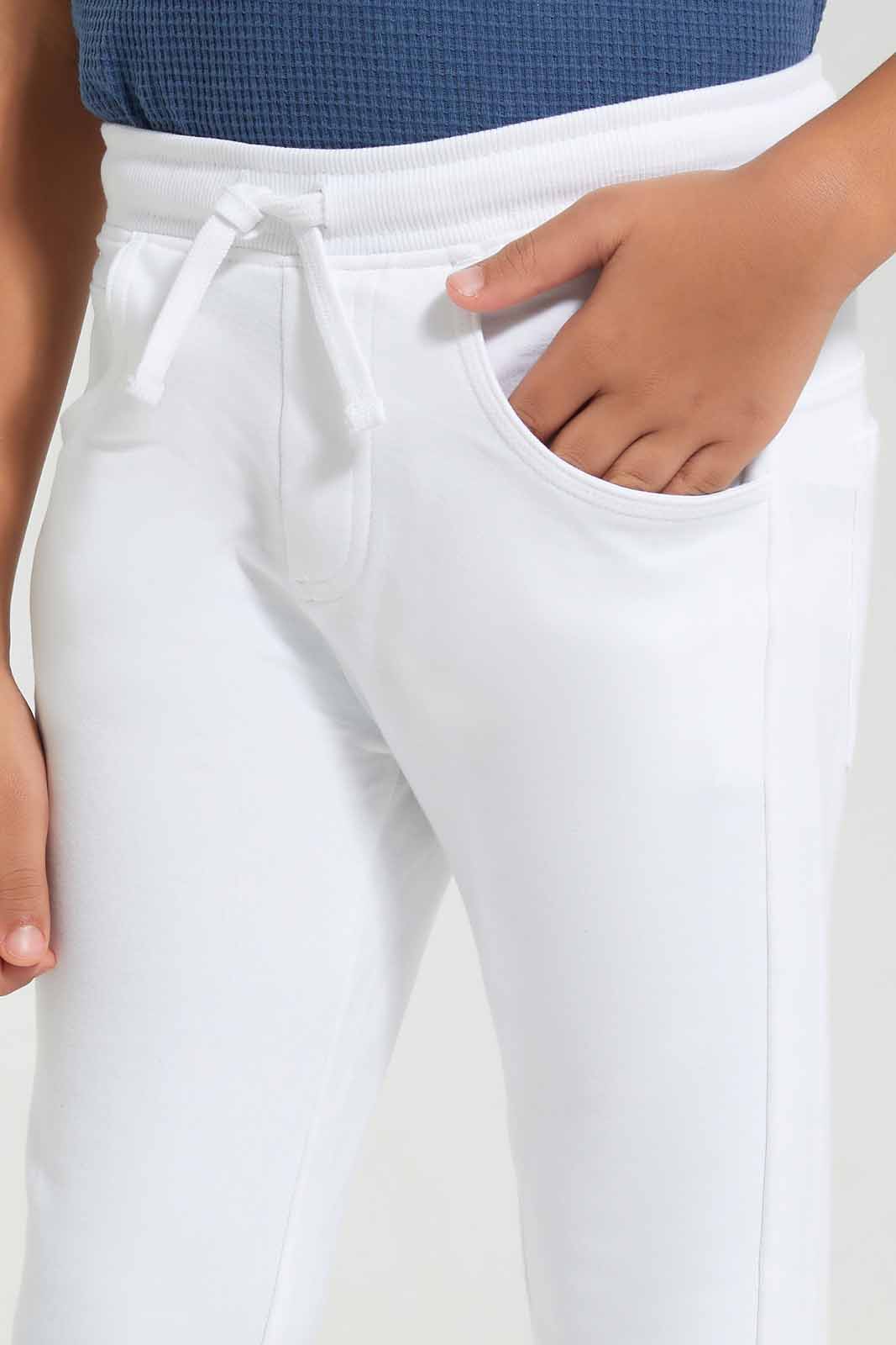 Redtag-White-Stretch-terry-Pant-BOY-Joggers,-Category:Joggers,-Colour:White,-Deals:New-In,-Filter:Boys-(2-to-8-Yrs),-New-In-BOY-APL,-Non-Sale,-Section:Boys-(0-to-14Yrs),-TBL,-W22A-Boys-2 to 8 Years