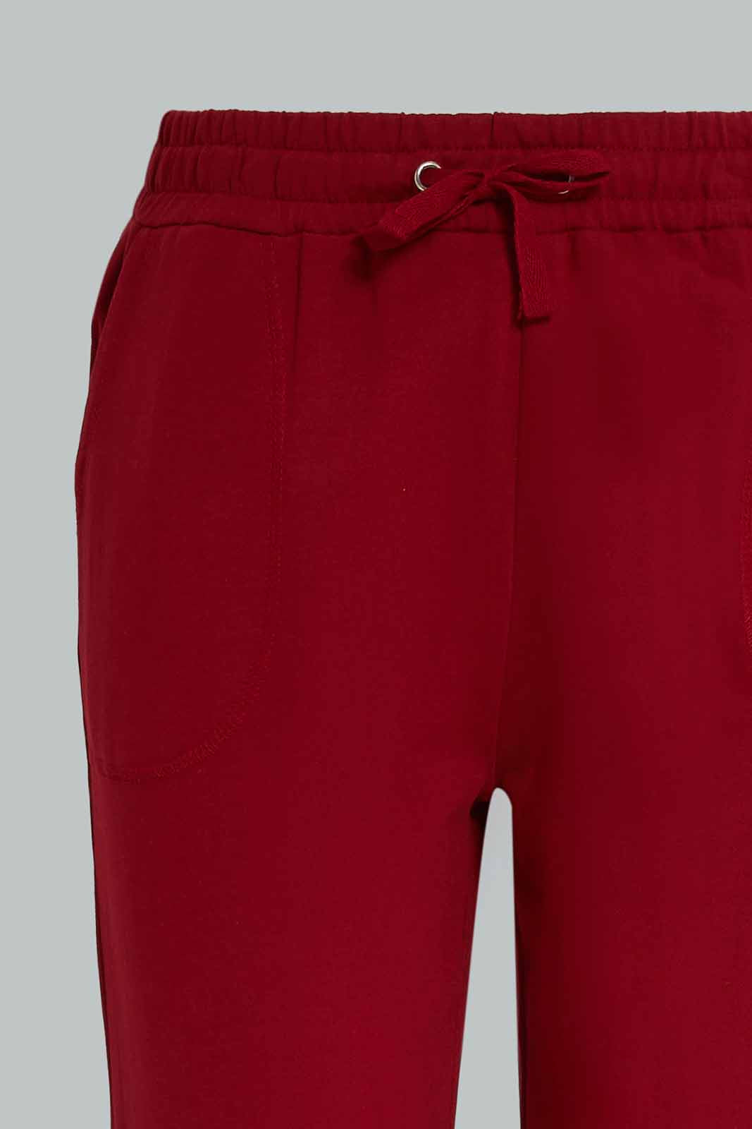 Redtag-Burgundy-Basic-Track-Pants-Category:Joggers,-Colour:Burgundy,-Deals:New-In,-Dept:Girls,-Filter:Senior-Girls-(8-to-14-Yrs),-GSR-Joggers,-New-In-GSR-APL,-Non-Sale,-Section:Girls-(0-to-14Yrs),-TBL,-W22B-Senior-Girls-9 to 14 Years