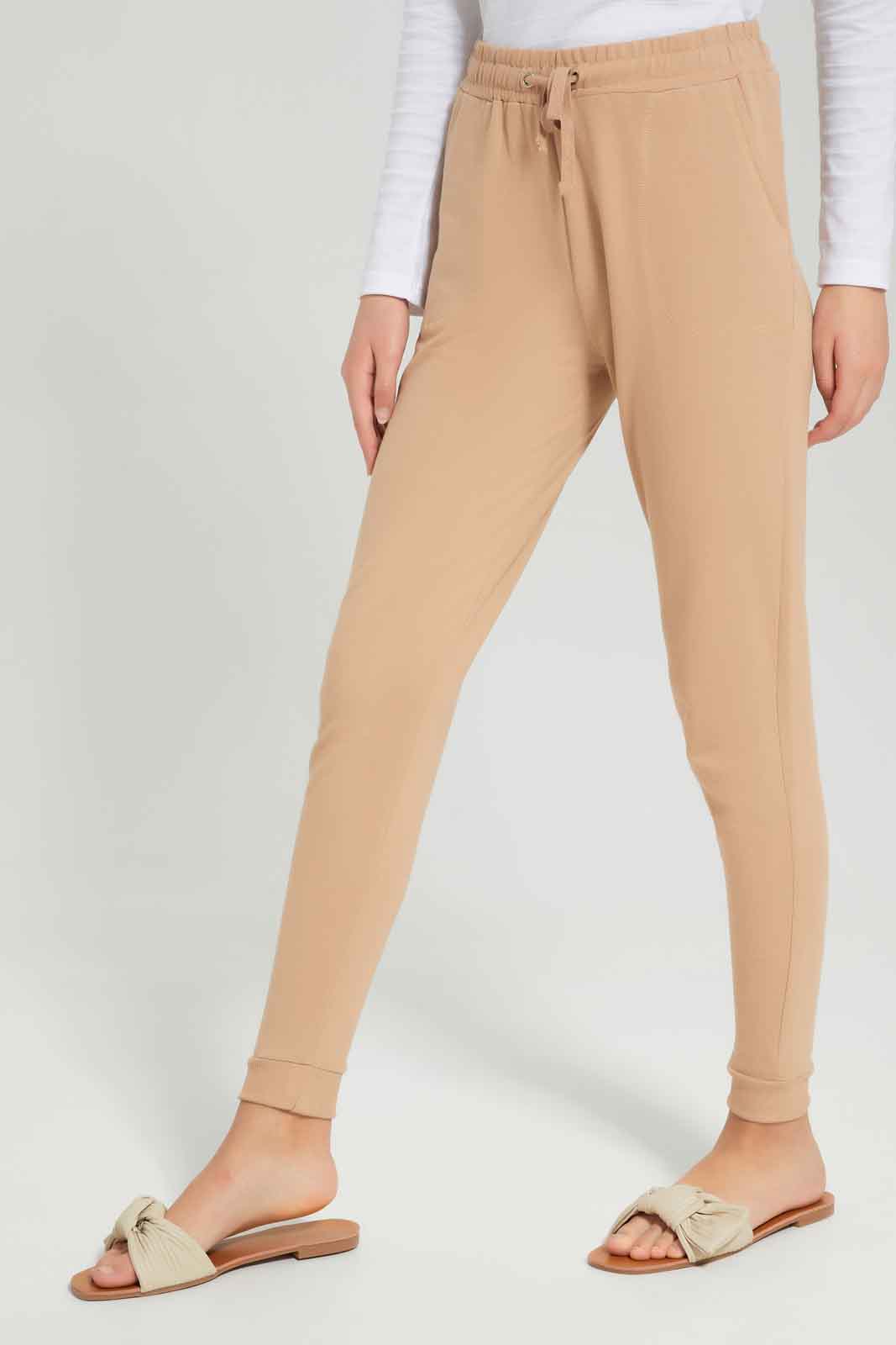 Redtag-Beige-Basic-Track-Pants-Category:Joggers,-Colour:Beige,-Deals:New-In,-Dept:Girls,-Filter:Senior-Girls-(8-to-14-Yrs),-GSR-Joggers,-New-In-GSR-APL,-Non-Sale,-Section:Girls-(0-to-14Yrs),-TBL,-W22B-Senior-Girls-9 to 14 Years
