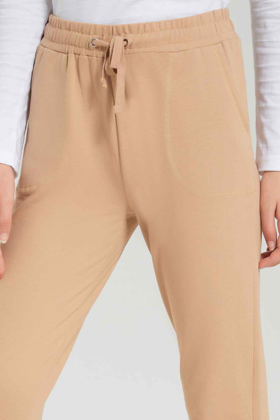 Redtag-Beige-Basic-Track-Pants-Category:Joggers,-Colour:Beige,-Deals:New-In,-Dept:Girls,-Filter:Senior-Girls-(8-to-14-Yrs),-GSR-Joggers,-New-In-GSR-APL,-Non-Sale,-Section:Girls-(0-to-14Yrs),-TBL,-W22B-Senior-Girls-9 to 14 Years