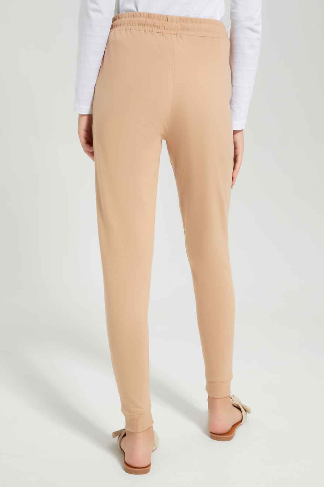 Redtag-Beige-Basic-Track-Pants-Category:Joggers,-Colour:Beige,-Deals:New-In,-Dept:Girls,-Filter:Senior-Girls-(8-to-14-Yrs),-GSR-Joggers,-New-In-GSR-APL,-Non-Sale,-Section:Girls-(0-to-14Yrs),-TBL,-W22B-Senior-Girls-9 to 14 Years