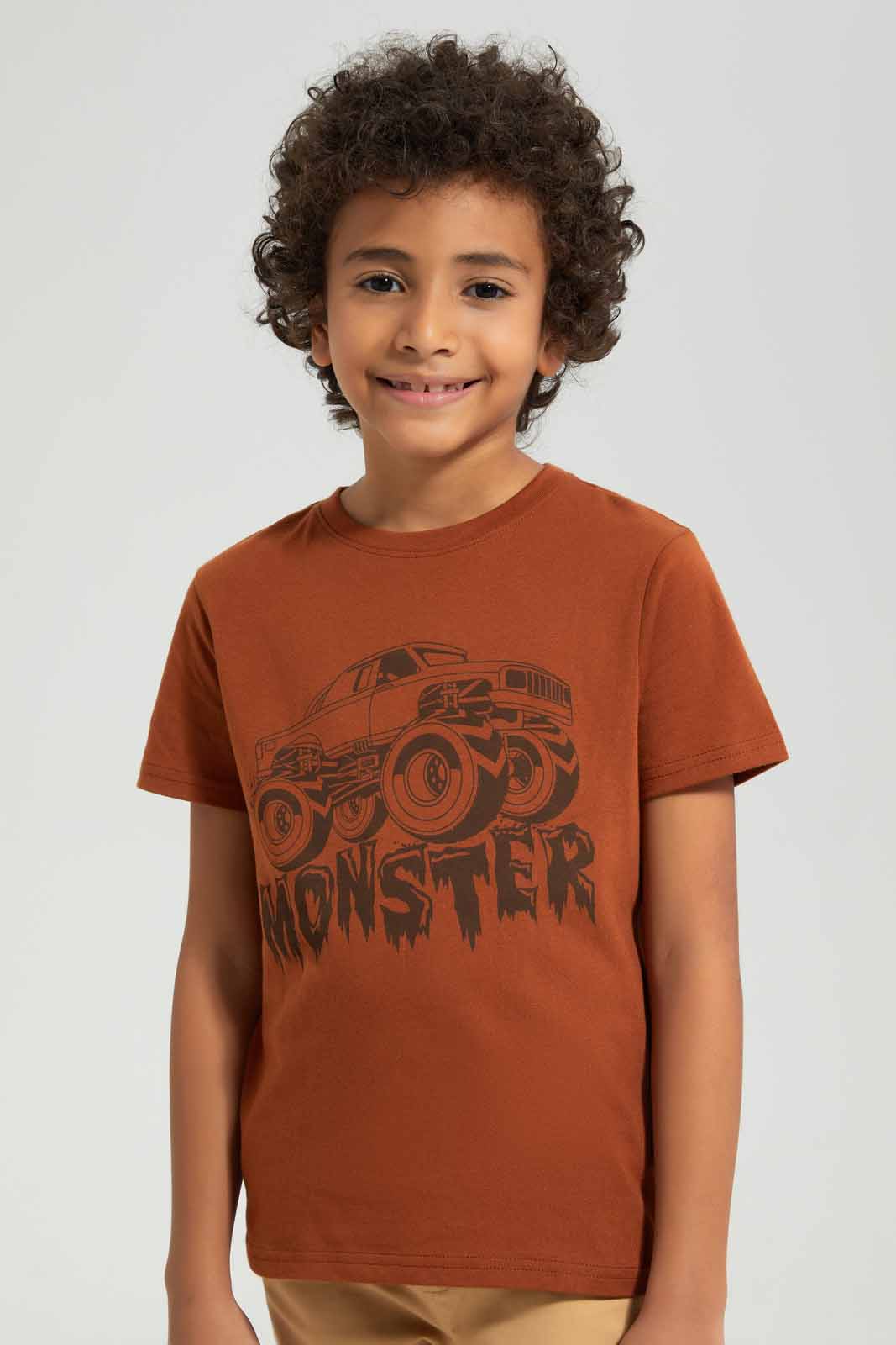 Redtag-Brown-Monster-Truck-Print-Short-Sleeve-T---shirt-BOY-T-Shirts,-Category:T-Shirts,-Colour:Brown,-Deals:New-In,-Filter:Boys-(2-to-8-Yrs),-New-In-BOY-APL,-Non-Sale,-Section:Boys-(0-to-14Yrs),-TBL,-W22A-Boys-2 to 8 Years
