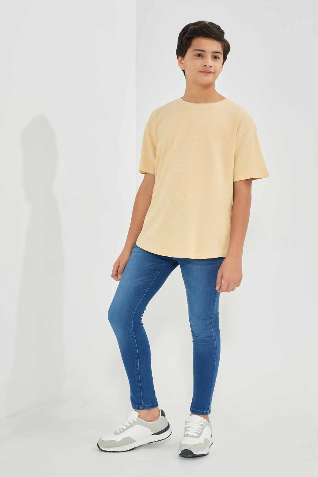 Redtag-Beige-Popcorn-Kint-Dropdown-Shoulder-T-Shirt-BSR-T-Shirts,-Category:T-Shirts,-Colour:Beige,-Deals:New-In,-Filter:Senior-Boys-(8-to-14-Yrs),-New-In-BSR-APL,-Non-Sale,-Section:Boys-(0-to-14Yrs),-TBL,-W22B-Senior-Boys-9 to 14 Years
