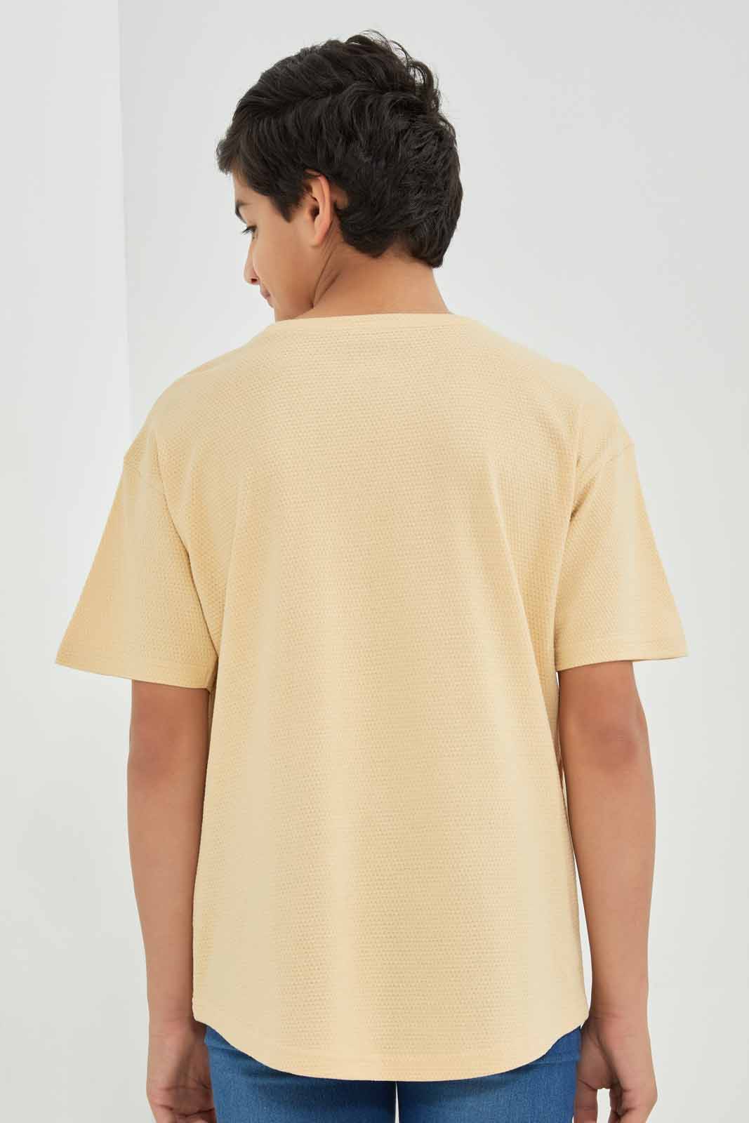 Redtag-Beige-Popcorn-Kint-Dropdown-Shoulder-T-Shirt-BSR-T-Shirts,-Category:T-Shirts,-Colour:Beige,-Deals:New-In,-Filter:Senior-Boys-(8-to-14-Yrs),-New-In-BSR-APL,-Non-Sale,-Section:Boys-(0-to-14Yrs),-TBL,-W22B-Senior-Boys-9 to 14 Years