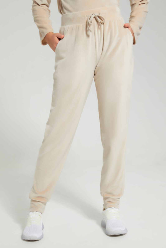 Redtag-Beige-Velour-Pants-Category:Joggers,-Colour:Beige,-Deals:New-In,-Filter:Senior-Girls-(8-to-14-Yrs),-GSR-Joggers,-New-In-GSR-APL,-Non-Sale,-Section:Girls-(0-to-14Yrs),-TBL,-W22B-Senior-Girls-9 to 14 Years