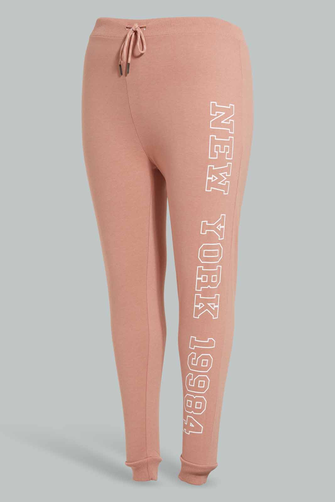Redtag-Pink-Joggers-Side-Tape-Category:Joggers,-Colour:Apricot,-Deals:New-In,-Filter:Plus-Size,-LDP-Joggers,-New-In-LDP-APL,-Non-Sale,-Section:Women,-W22A-Women's-