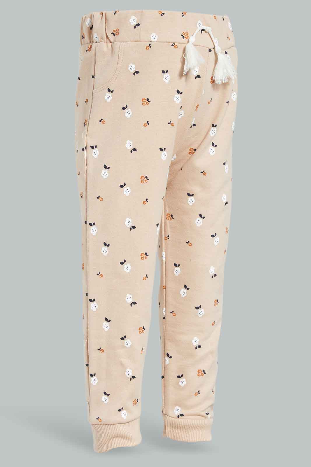 Redtag-Beige-Floral-AOP-Trackpant-Category:Joggers,-Colour:Beige,-Deals:New-In,-Filter:Infant-Girls-(3-to-24-Mths),-ING-Joggers,-New-In-ING-APL,-Non-Sale,-Section:Girls-(0-to-14Yrs),-TBL,-W22B-Infant-Girls-3 to 24 Months