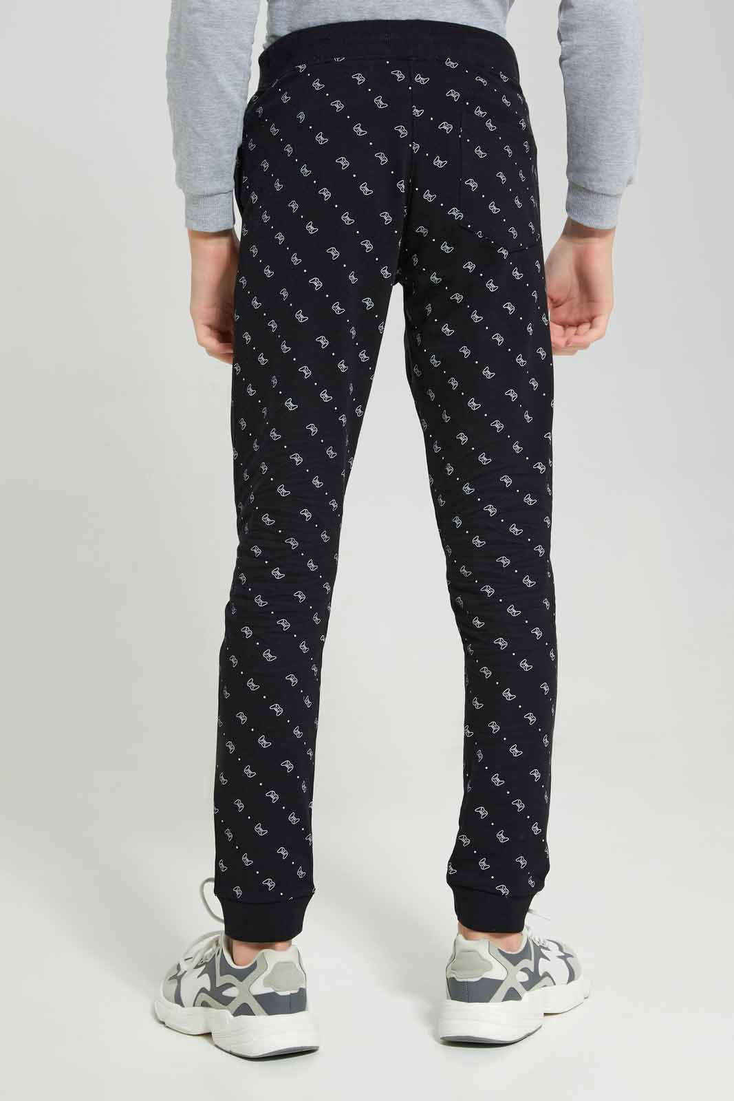 Redtag-Black-Coordinated-Gaming-AOP-Active-Pants-BSR-Joggers,-Category:Joggers,-Colour:Black,-Deals:New-In,-Filter:Senior-Boys-(8-to-14-Yrs),-New-In-BSR-APL,-Non-Sale,-Section:Boys-(0-to-14Yrs),-TBL,-W22A-Senior-Boys-9 to 14 Years