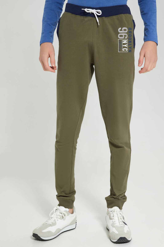 Redtag-Olive-Coordinated-NYC-Active-Pants-BSR-Joggers,-Category:Joggers,-Colour:Green,-Deals:New-In,-Filter:Senior-Boys-(8-to-14-Yrs),-NDAY,-New-In-BSR-APL,-Non-Sale,-Section:Boys-(0-to-14Yrs),-TBL,-W22A-Senior-Boys-9 to 14 Years