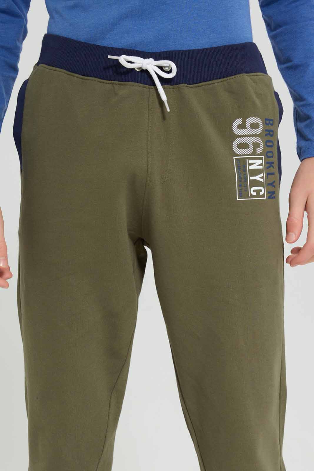 Redtag-Olive-Coordinated-NYC-Active-Pants-BSR-Joggers,-Category:Joggers,-Colour:Green,-Deals:New-In,-Filter:Senior-Boys-(8-to-14-Yrs),-NDAY,-New-In-BSR-APL,-Non-Sale,-Section:Boys-(0-to-14Yrs),-TBL,-W22A-Senior-Boys-9 to 14 Years