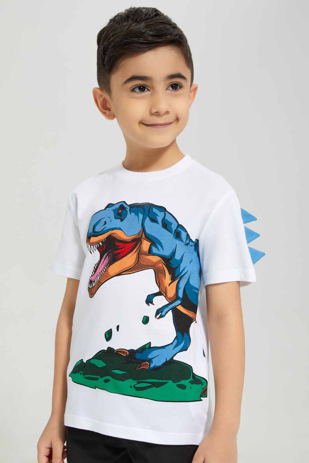 Redtag-White-Dino-Print-T-Shirt-BOY-T-Shirts,-BTS,-Category:T-Shirts,-Colour:White,-Deals:New-In,-Filter:Boys-(2-to-8-Yrs),-New-In-BOY-APL,-Non-Sale,-Section:Boys-(0-to-14Yrs),-W22B-Boys-2 to 8 Years