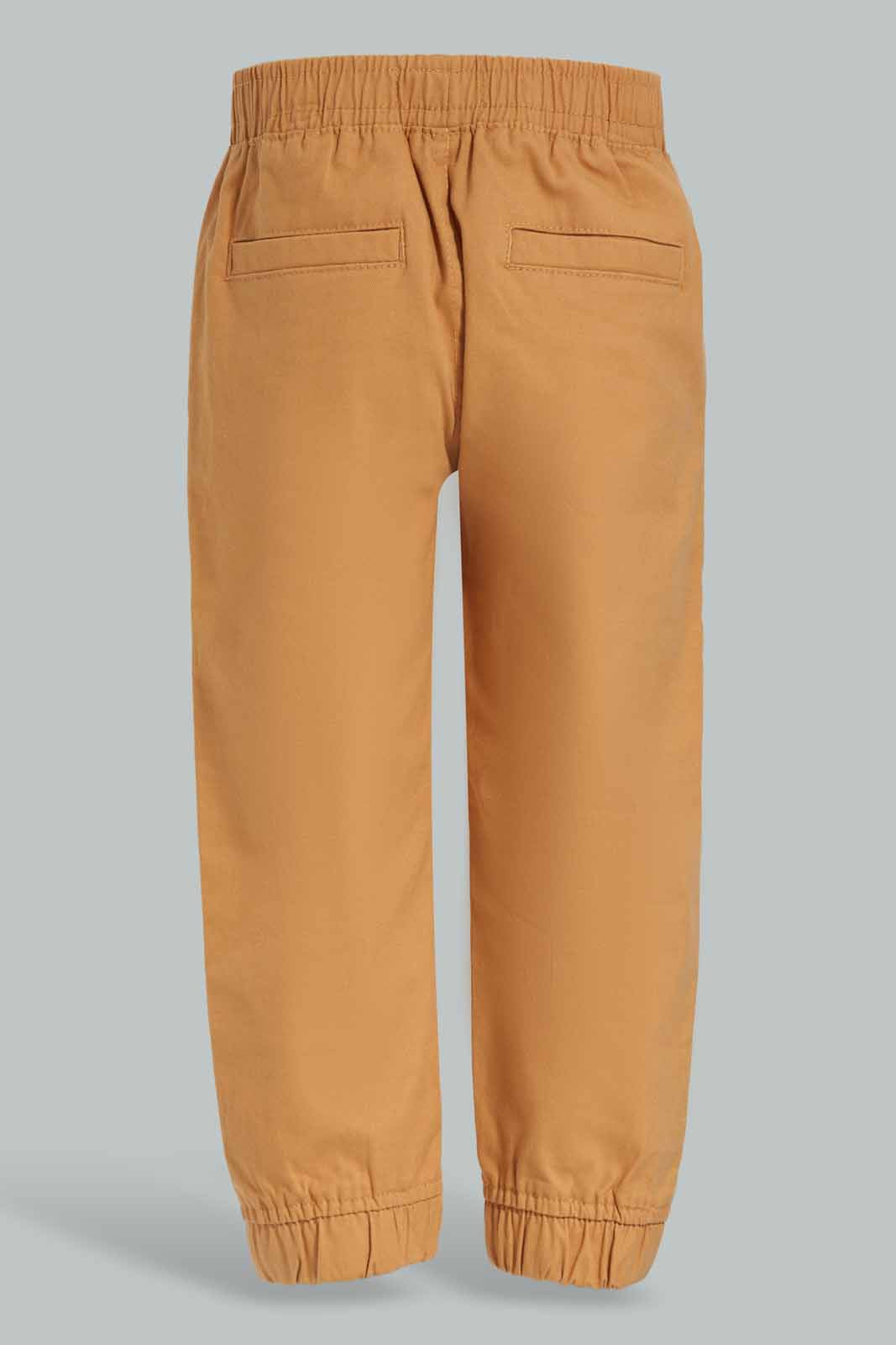 Redtag-Rust-Chino-Jogger-Category:Trousers,-Colour:Orange,-Deals:New-In,-Dept:Boys,-Filter:Infant-Boys-(3-to-24-Mths),-INB-Trousers,-New-In-INB-APL,-Non-Sale,-Section:Boys-(0-to-14Yrs),-W22B-Infant-Boys-3 to 24 Months