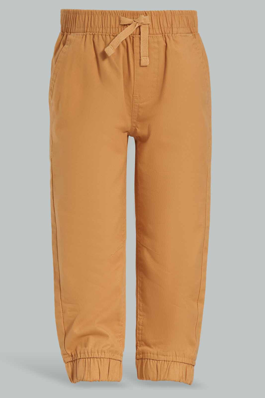 Redtag-Rust-Chino-Jogger-Category:Trousers,-Colour:Orange,-Deals:New-In,-Dept:Boys,-Filter:Infant-Boys-(3-to-24-Mths),-INB-Trousers,-New-In-INB-APL,-Non-Sale,-Section:Boys-(0-to-14Yrs),-W22B-Infant-Boys-3 to 24 Months