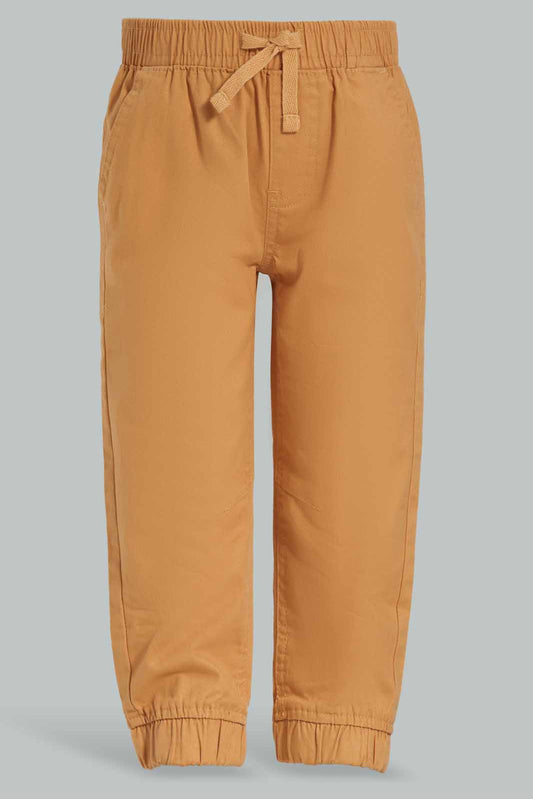 Redtag-Rust-Chino-Jogger-Category:Trousers,-Colour:Orange,-Deals:New-In,-Dept:Boys,-Filter:Infant-Boys-(3-to-24-Mths),-INB-Trousers,-New-In-INB-APL,-Non-Sale,-Section:Boys-(0-to-14Yrs),-W22B-Infant-Boys-3 to 24 Months