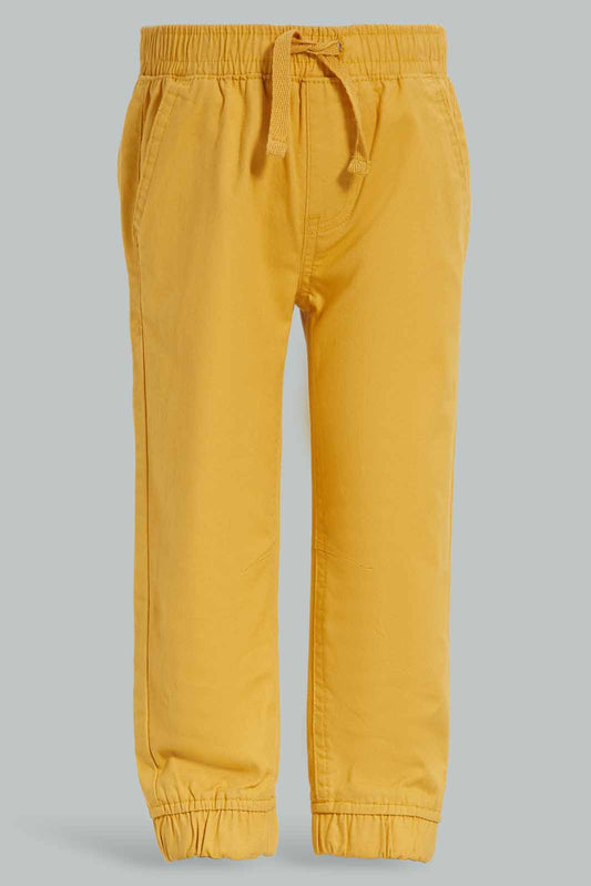 Redtag-Mustard-Chino-Jogger-Category:Trousers,-Colour:Mustard,-Deals:New-In,-Dept:Boys,-Filter:Infant-Boys-(3-to-24-Mths),-INB-Trousers,-New-In-INB-APL,-Non-Sale,-Section:Boys-(0-to-14Yrs),-W22B-Infant-Boys-3 to 24 Months