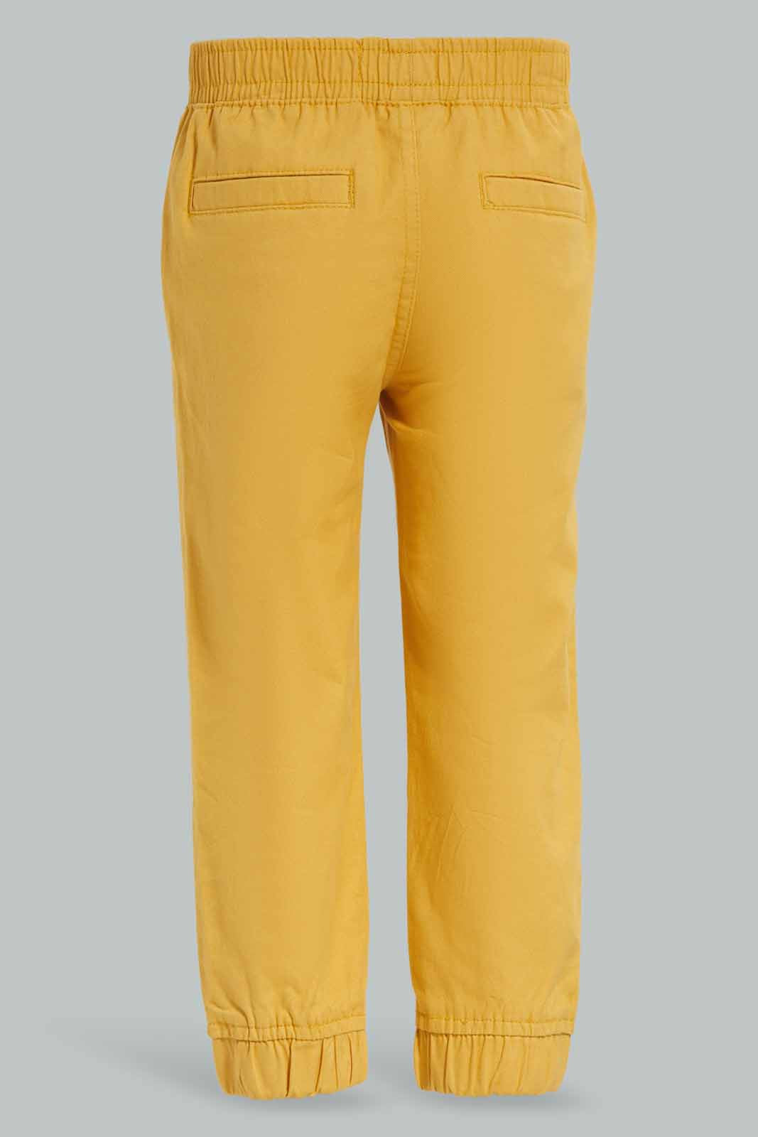 Redtag-Mustard-Chino-Jogger-Category:Trousers,-Colour:Mustard,-Deals:New-In,-Dept:Boys,-Filter:Infant-Boys-(3-to-24-Mths),-INB-Trousers,-New-In-INB-APL,-Non-Sale,-Section:Boys-(0-to-14Yrs),-W22B-Infant-Boys-3 to 24 Months