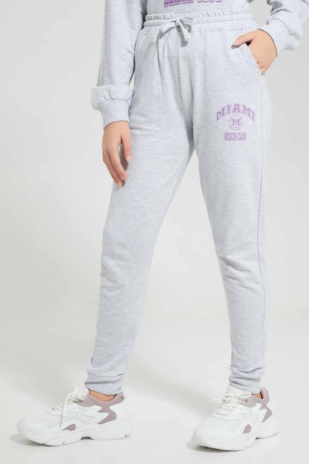 Redtag-Grey-Melange-Track-Pants-With-Print-Category:Joggers,-Colour:Grey,-Deals:New-In,-Filter:Senior-Girls-(8-to-14-Yrs),-GSR-Joggers,-New-In-GSR-APL,-Non-Sale,-Section:Girls-(0-to-14Yrs),-W22A-Senior-Girls-9 to 14 Years