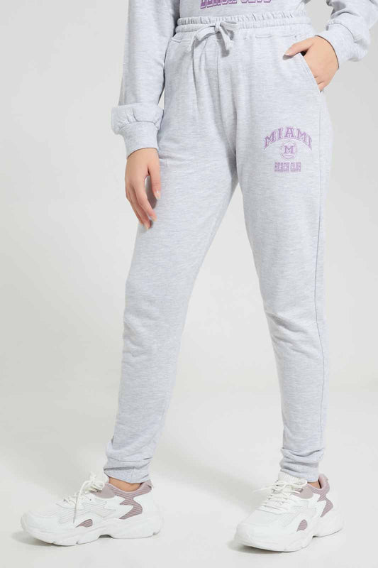 Redtag-Grey-Melange-Track-Pants-With-Print-Category:Joggers,-Colour:Grey,-Deals:New-In,-Filter:Senior-Girls-(8-to-14-Yrs),-GSR-Joggers,-New-In-GSR-APL,-Non-Sale,-Section:Girls-(0-to-14Yrs),-W22A-Senior-Girls-9 to 14 Years