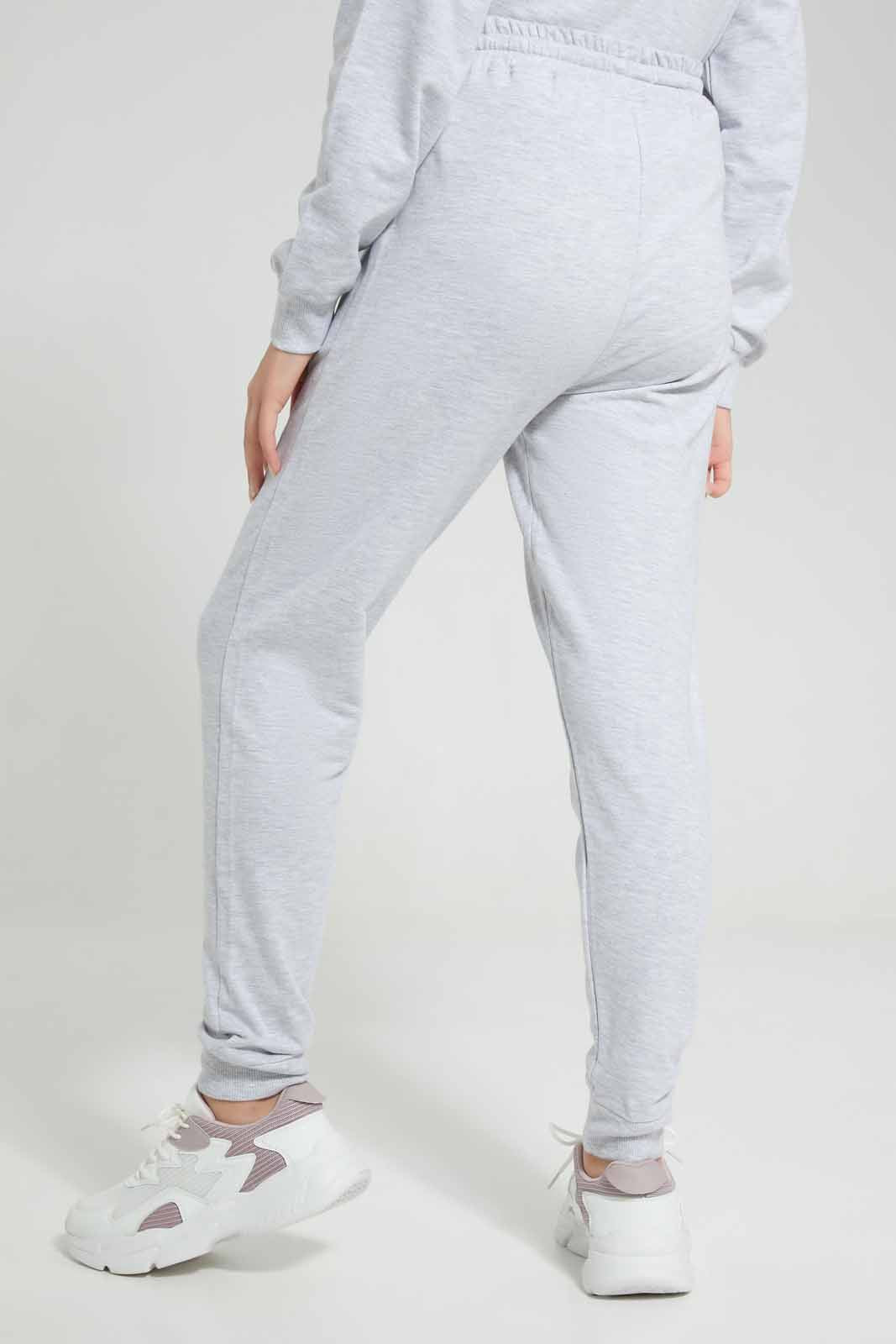 Redtag-Grey-Melange-Track-Pants-With-Print-Category:Joggers,-Colour:Grey,-Deals:New-In,-Filter:Senior-Girls-(8-to-14-Yrs),-GSR-Joggers,-New-In-GSR-APL,-Non-Sale,-Section:Girls-(0-to-14Yrs),-W22A-Senior-Girls-9 to 14 Years