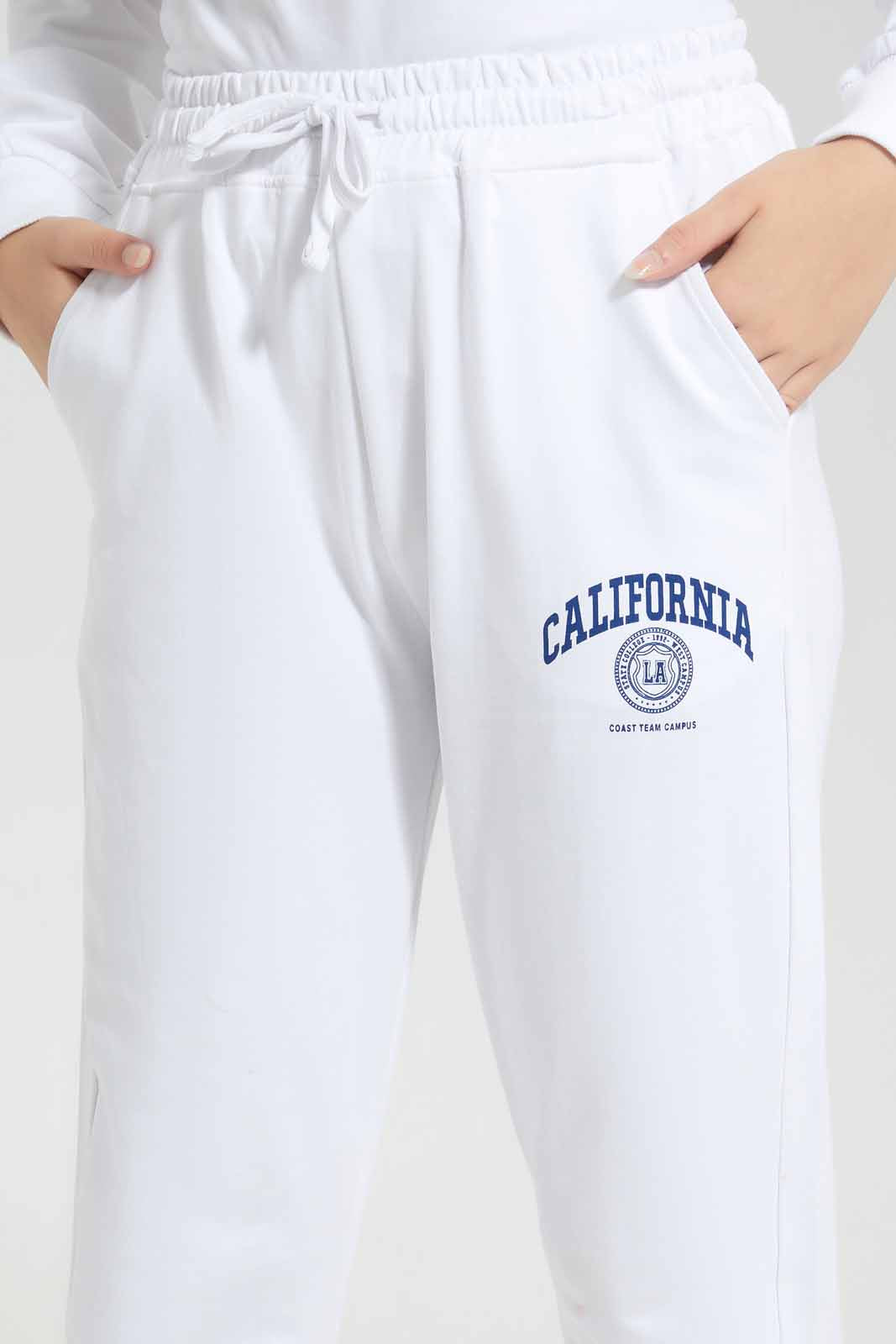 Redtag-White-Track-Pants-With-Print-Category:Joggers,-Colour:White,-Deals:New-In,-Filter:Senior-Girls-(8-to-14-Yrs),-GSR-Joggers,-New-In-GSR-APL,-Non-Sale,-Section:Girls-(0-to-14Yrs),-W22A-Senior-Girls-9 to 14 Years