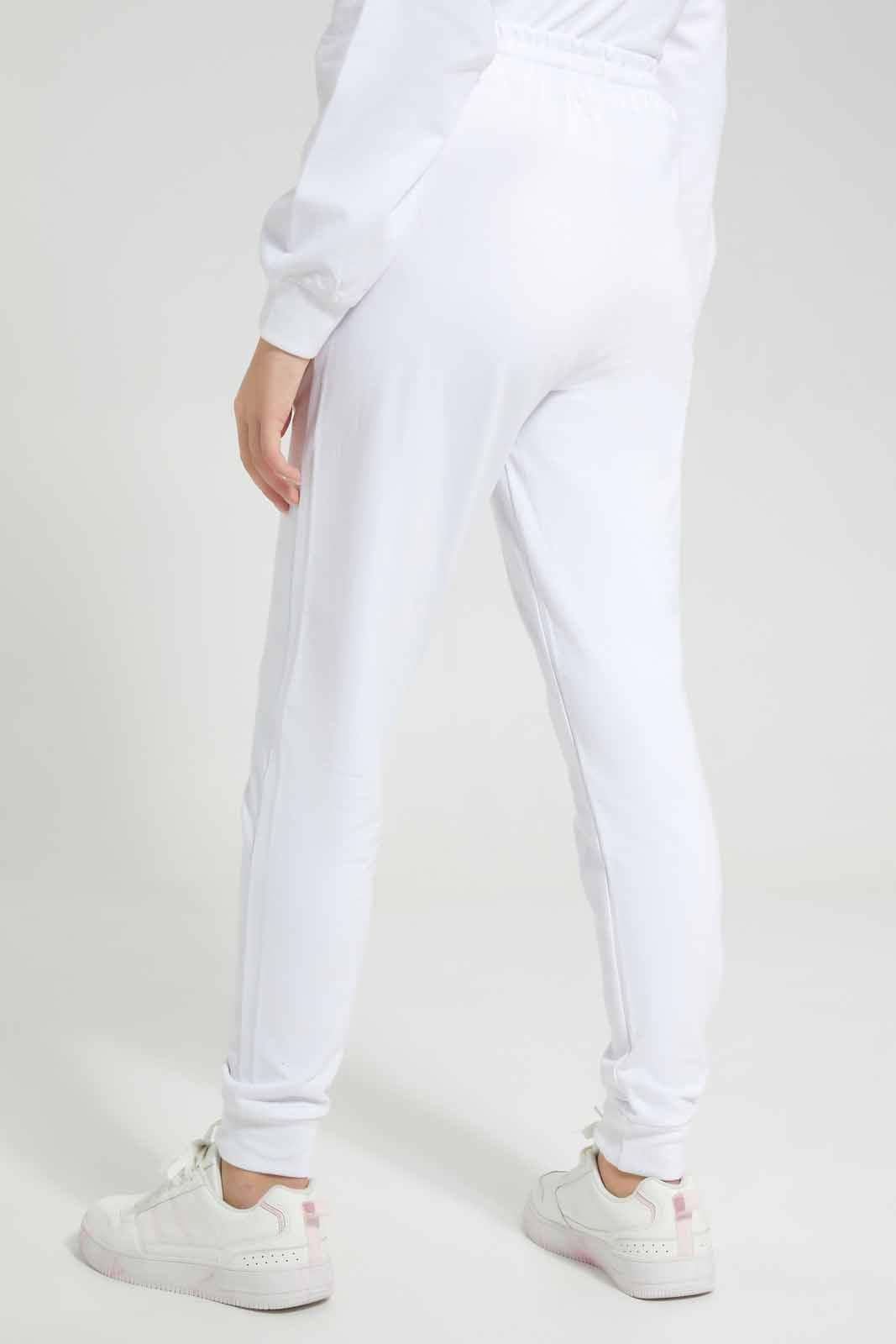 Redtag-White-Track-Pants-With-Print-Category:Joggers,-Colour:White,-Deals:New-In,-Filter:Senior-Girls-(8-to-14-Yrs),-GSR-Joggers,-New-In-GSR-APL,-Non-Sale,-Section:Girls-(0-to-14Yrs),-W22A-Senior-Girls-9 to 14 Years