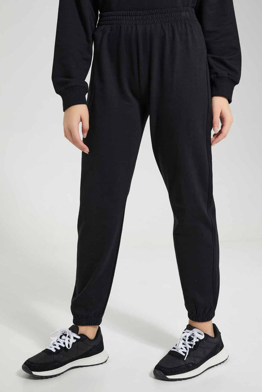 Redtag-Black-Track-Pants-Category:Joggers,-Colour:Black,-Deals:New-In,-Filter:Senior-Girls-(8-to-14-Yrs),-GSR-Joggers,-New-In-GSR-APL,-Non-Sale,-Section:Girls-(0-to-14Yrs),-W22A-Senior-Girls-9 to 14 Years