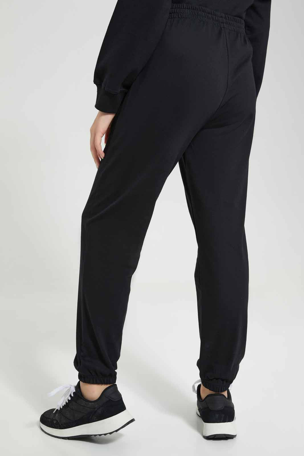 Redtag-Black-Track-Pants-Category:Joggers,-Colour:Black,-Deals:New-In,-Filter:Senior-Girls-(8-to-14-Yrs),-GSR-Joggers,-New-In-GSR-APL,-Non-Sale,-Section:Girls-(0-to-14Yrs),-W22A-Senior-Girls-9 to 14 Years
