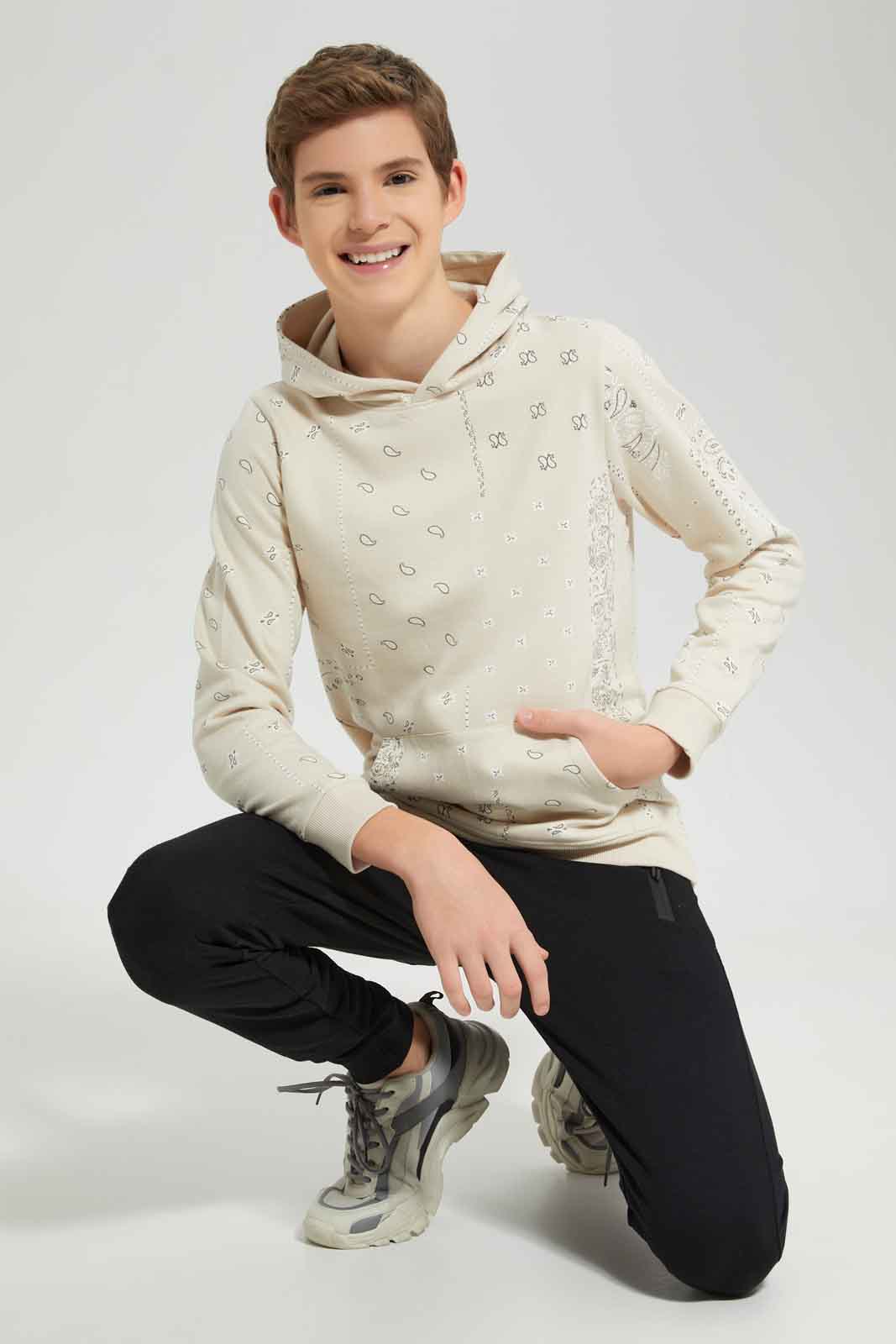 Redtag-Beige-Allover-Print-Sweatshirt-BSR-Sweatshirts,-Category:Sweatshirts,-Colour:Beige,-Deals:New-In,-Dept:Boys,-Filter:Senior-Boys-(8-to-14-Yrs),-New-In-BSR-APL,-Non-Sale,-Section:Boys-(0-to-14Yrs),-VLM,-W22B-Senior-Boys-9 to 14 Years
