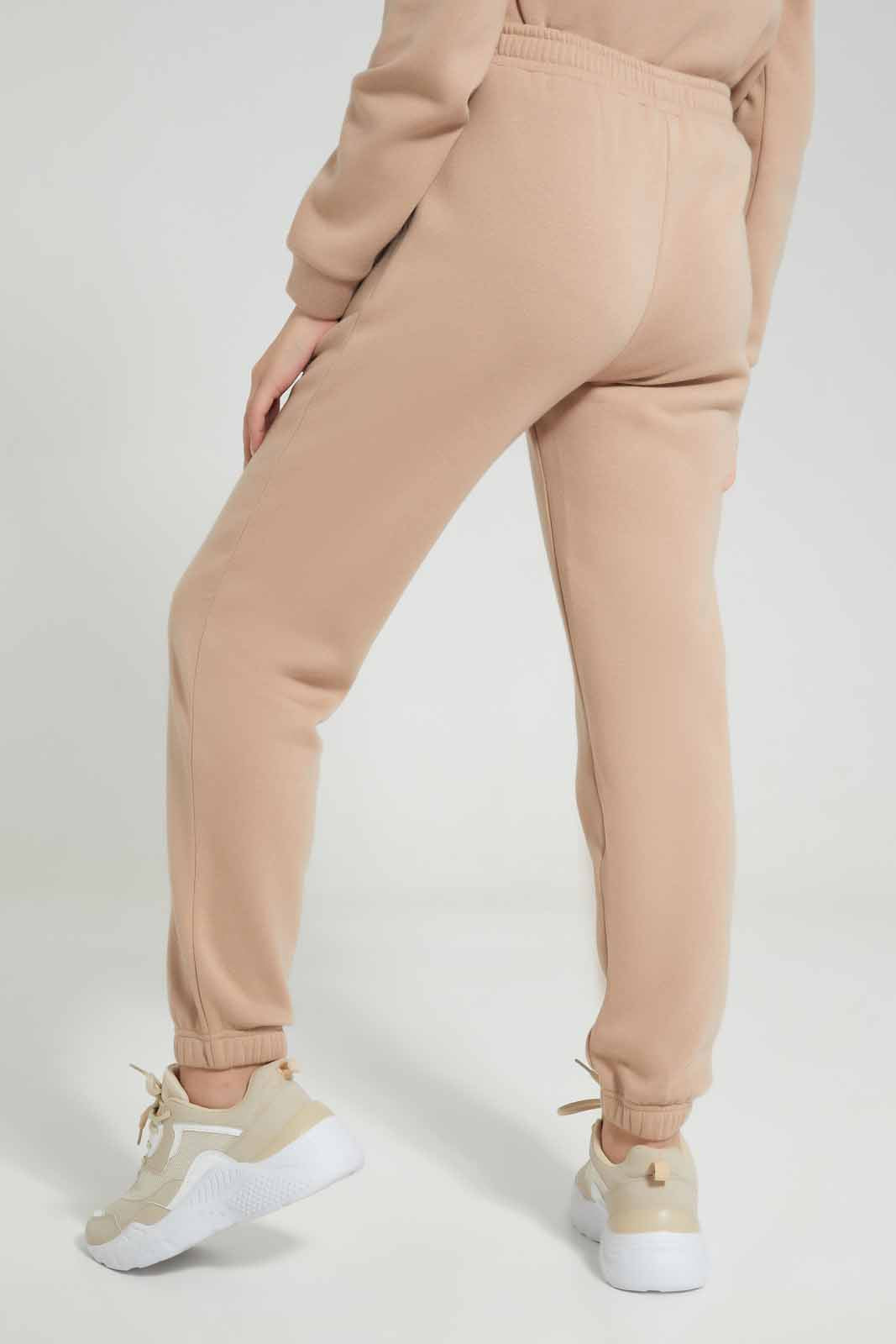 Redtag-Beige-Track-Pants-Category:Joggers,-Colour:Beige,-Deals:New-In,-Filter:Senior-Girls-(8-to-14-Yrs),-GSR-Joggers,-New-In-GSR-APL,-Non-Sale,-Section:Girls-(0-to-14Yrs),-W22B-Senior-Girls-9 to 14 Years