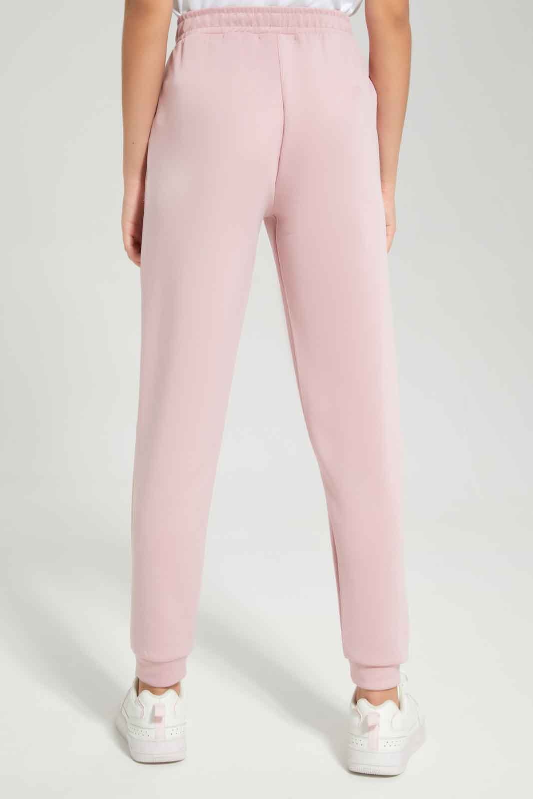 Redtag-Pink-Track-Pants-Category:Joggers,-Colour:Apricot,-Deals:New-In,-Dept:Girls,-Filter:Senior-Girls-(8-to-14-Yrs),-GSR-Joggers,-New-In-GSR-APL,-Non-Sale,-Section:Girls-(0-to-14Yrs),-W22B-Senior-Girls-9 to 14 Years