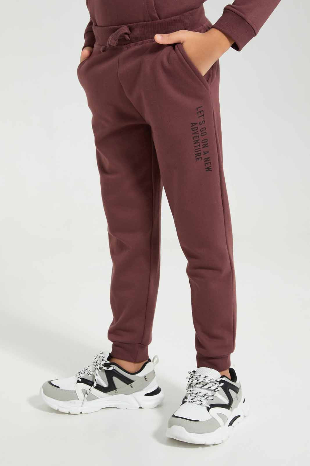 Redtag-Burgundy-Slogan-Print-Jog-Pant-BOY-Joggers,-Category:Joggers,-Colour:Burgundy,-Deals:New-In,-Filter:Boys-(2-to-8-Yrs),-New-In-BOY-APL,-Non-Sale,-Section:Boys-(0-to-14Yrs),-W22B-Boys-2 to 8 Years