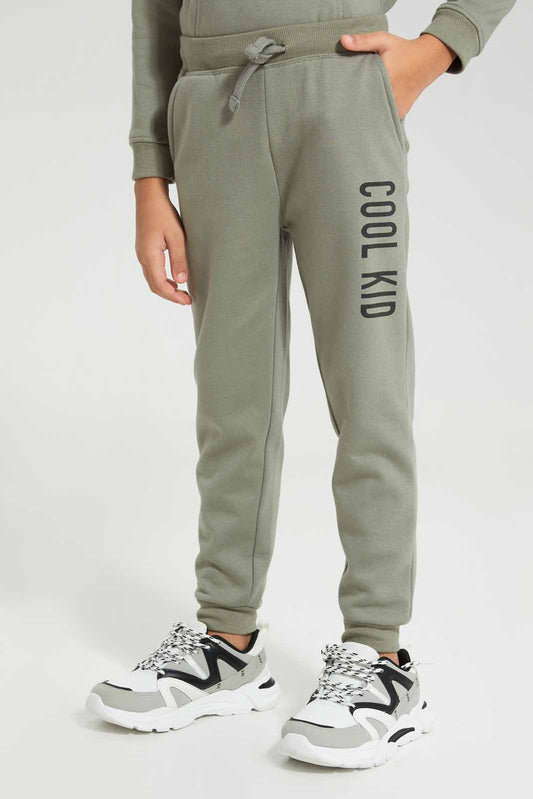 Redtag-Olive-Slogan-Print-Jog-Pant-BOY-Joggers,-Category:Joggers,-Colour:Olive,-Deals:New-In,-Filter:Boys-(2-to-8-Yrs),-New-In-BOY-APL,-Non-Sale,-Section:Boys-(0-to-14Yrs),-W22B-Boys-2 to 8 Years