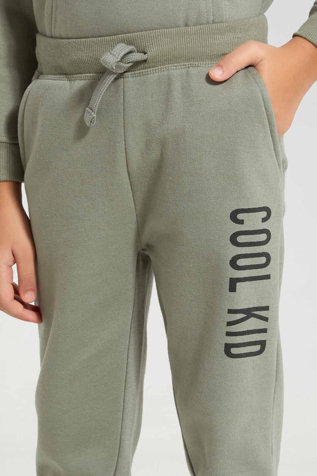 Redtag-Olive-Slogan-Print-Jog-Pant-BOY-Joggers,-Category:Joggers,-Colour:Olive,-Deals:New-In,-Filter:Boys-(2-to-8-Yrs),-New-In-BOY-APL,-Non-Sale,-Section:Boys-(0-to-14Yrs),-W22B-Boys-2 to 8 Years