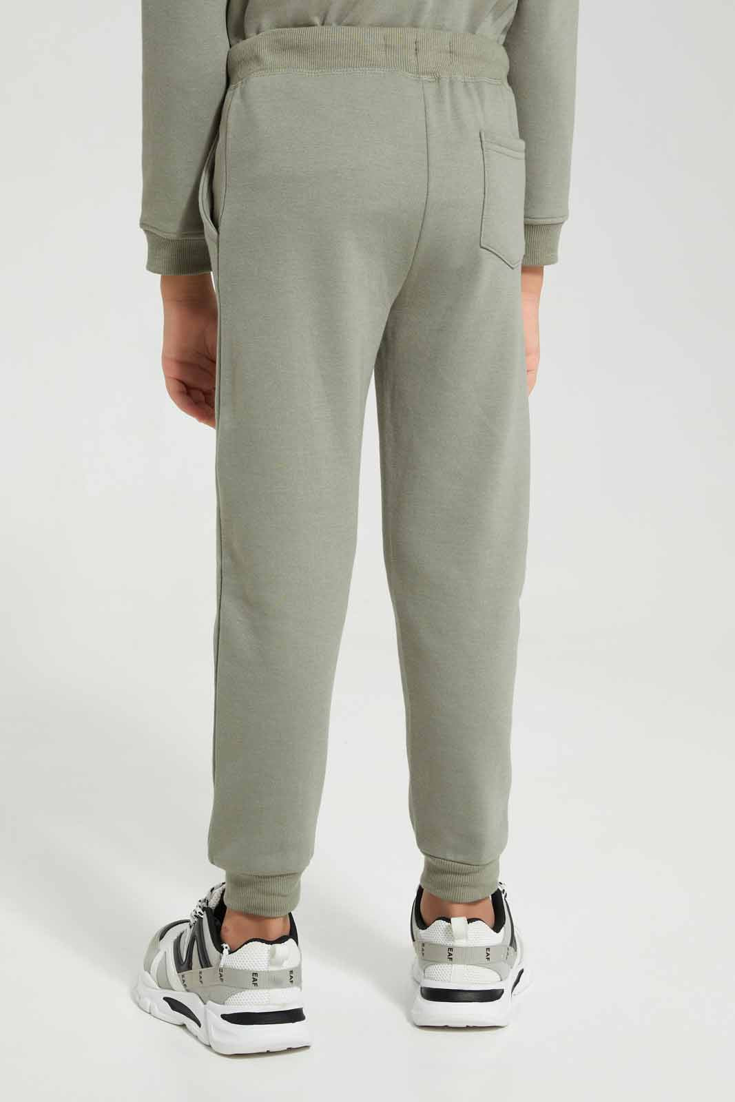 Redtag-Olive-Slogan-Print-Jog-Pant-BOY-Joggers,-Category:Joggers,-Colour:Olive,-Deals:New-In,-Filter:Boys-(2-to-8-Yrs),-New-In-BOY-APL,-Non-Sale,-Section:Boys-(0-to-14Yrs),-W22B-Boys-2 to 8 Years
