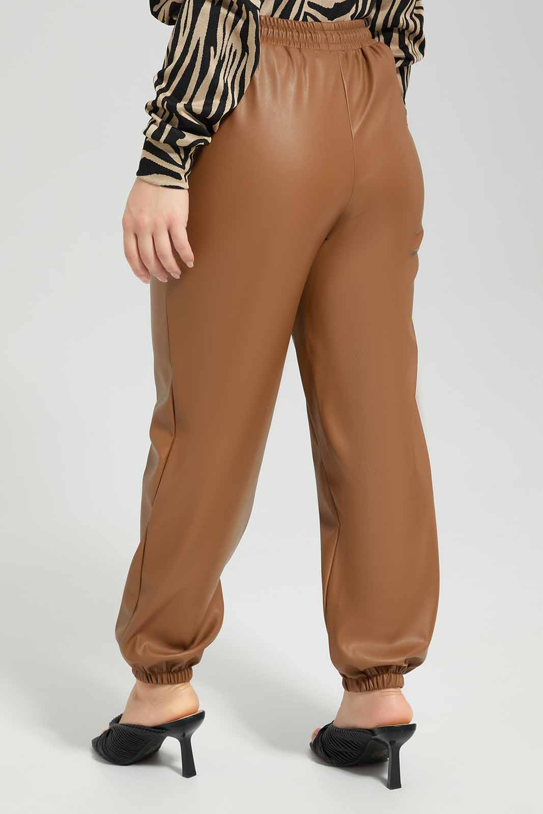 Redtag-Tan-PU-Elasticated-Waist-Jogger-Category:Trousers,-Colour:Tan,-Deals:New-In,-Filter:Women's-Clothing,-LMC,-Modest,-New-In-Women-APL,-Non-Sale,-Section:Women,-W22B,-Women-Trousers--