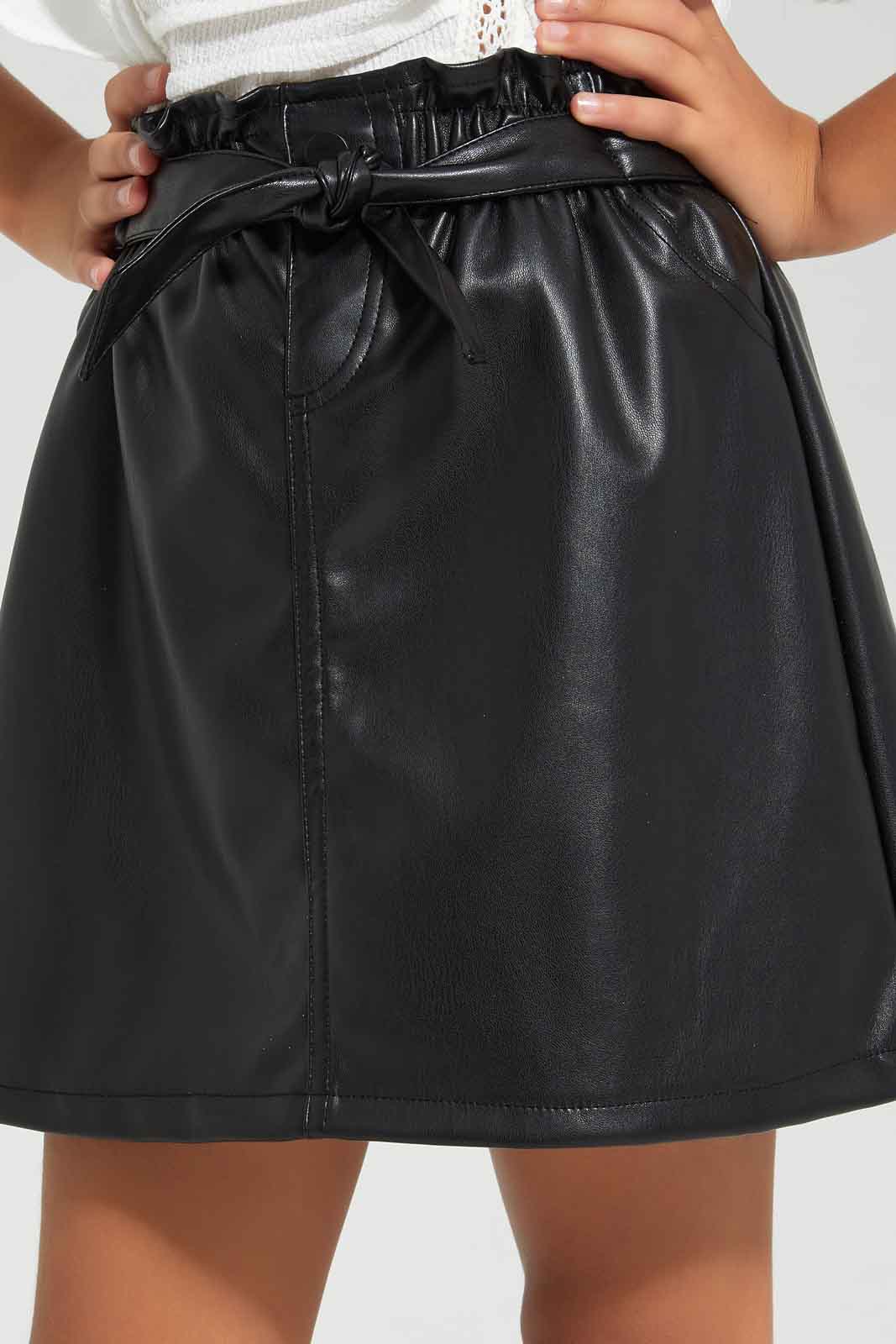 Redtag-Black-PU-Skirt-Bow-BTS,-Category:Skirts,-Colour:Black,-Deals:New-In,-Filter:Girls-(2-to-8-Yrs),-GIR-Skirts,-New-In-GIR-APL,-Non-Sale,-Section:Girls-(0-to-14Yrs),-W22B-Girls-2 to 8 Years