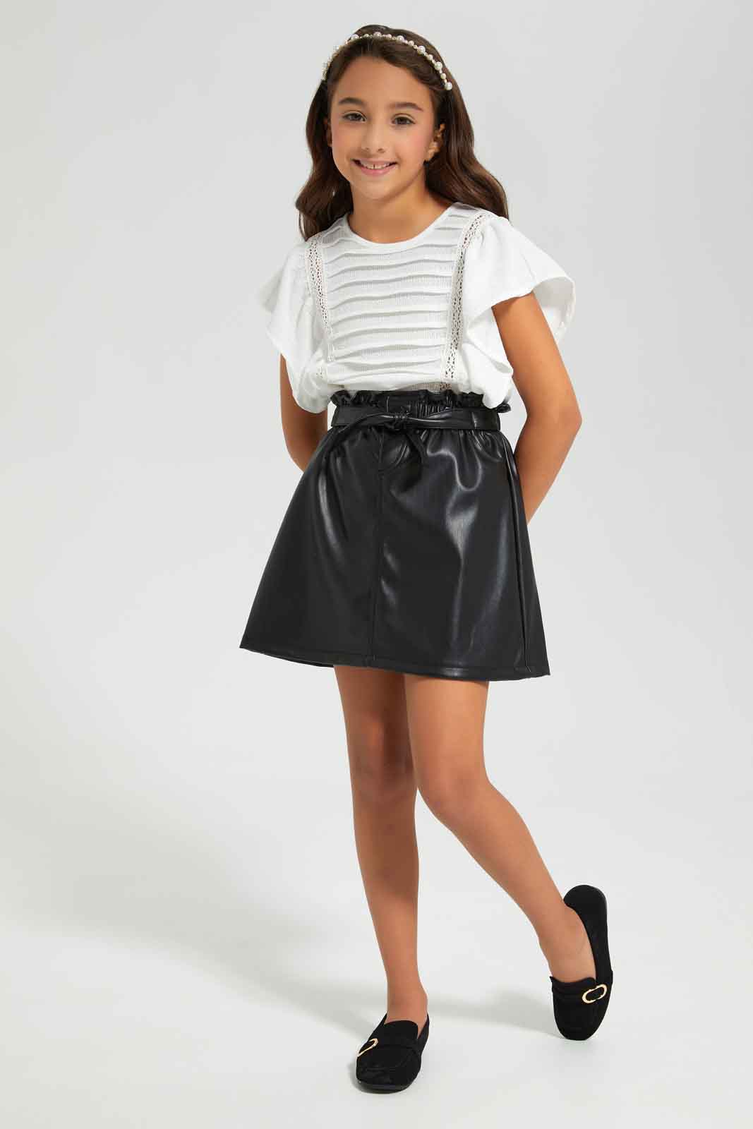 Redtag-Black-PU-Skirt-Bow-BTS,-Category:Skirts,-Colour:Black,-Deals:New-In,-Filter:Girls-(2-to-8-Yrs),-GIR-Skirts,-New-In-GIR-APL,-Non-Sale,-Section:Girls-(0-to-14Yrs),-W22B-Girls-2 to 8 Years