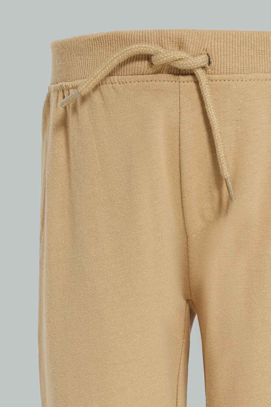 Redtag-Boys-White-And-Stone-2-Pack-Active-Pants-Category:Joggers,-Colour:Grey,-Deals:New-In,-Dept:Boys,-Filter:Infant-Boys-(3-to-24-Mths),-INB-Joggers,-New-In-INB-APL,-Non-Sale,-Section:Boys-(0-to-14Yrs),-W22B-Infant-Boys-3 to 24 Months